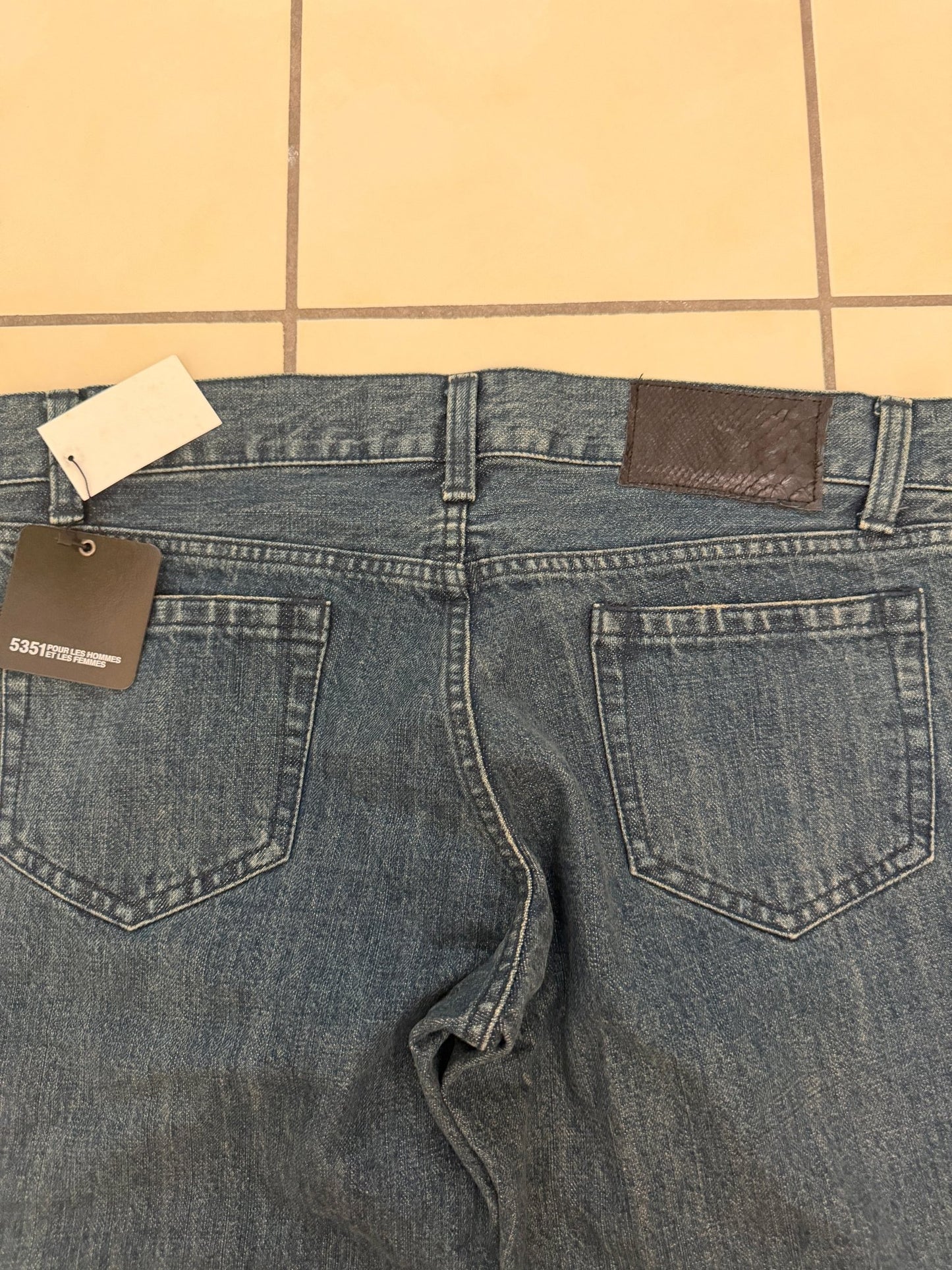 5351 Pour Les Hommes Distressed Python Flared Denim Pants - wintexarchive