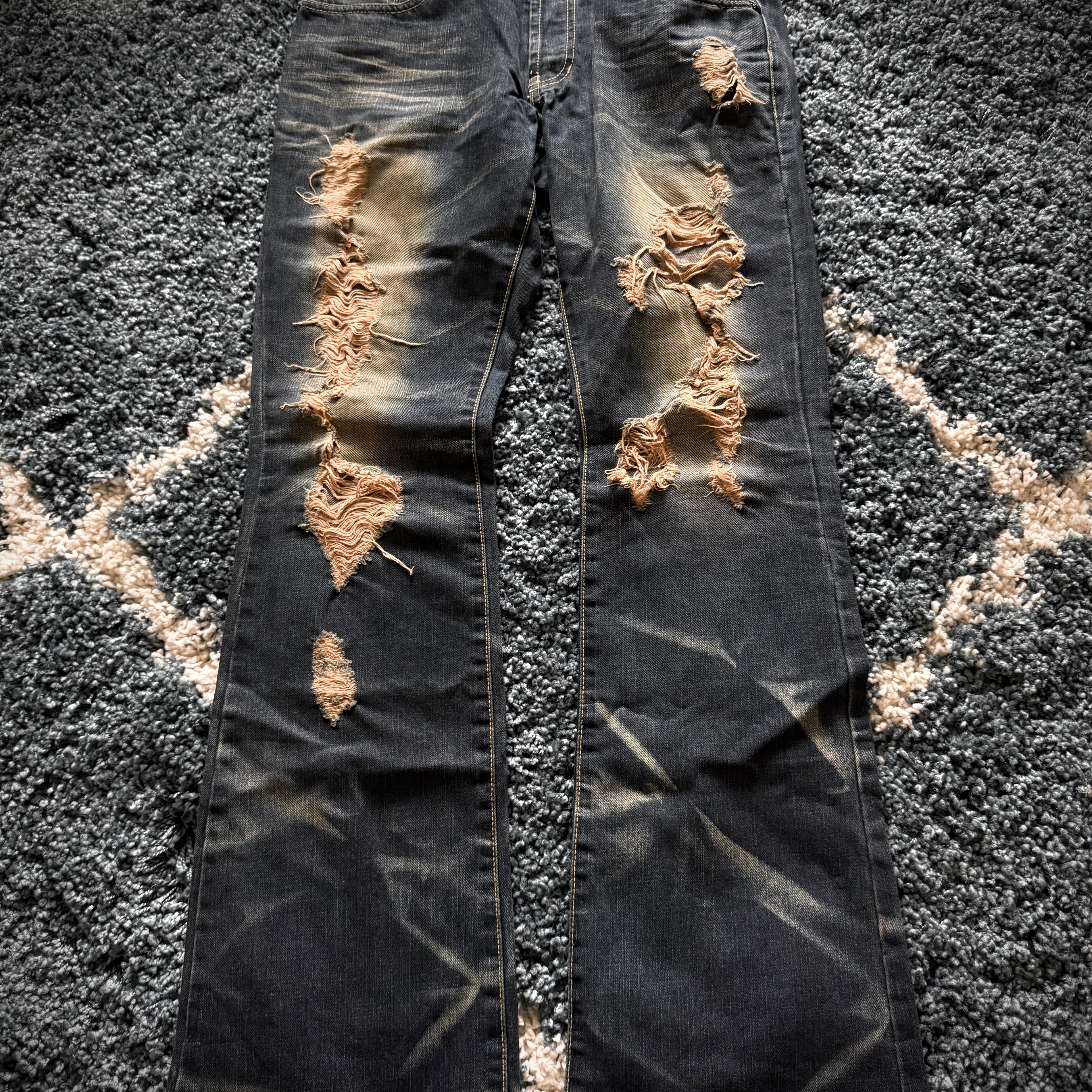 FUGA crashed distressed ponyhair&snakeskin patch flared denim