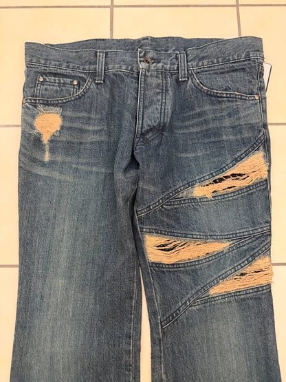 5351 Pour Les Hommes Distressed Python Flared Denim Pants - wintexarchive