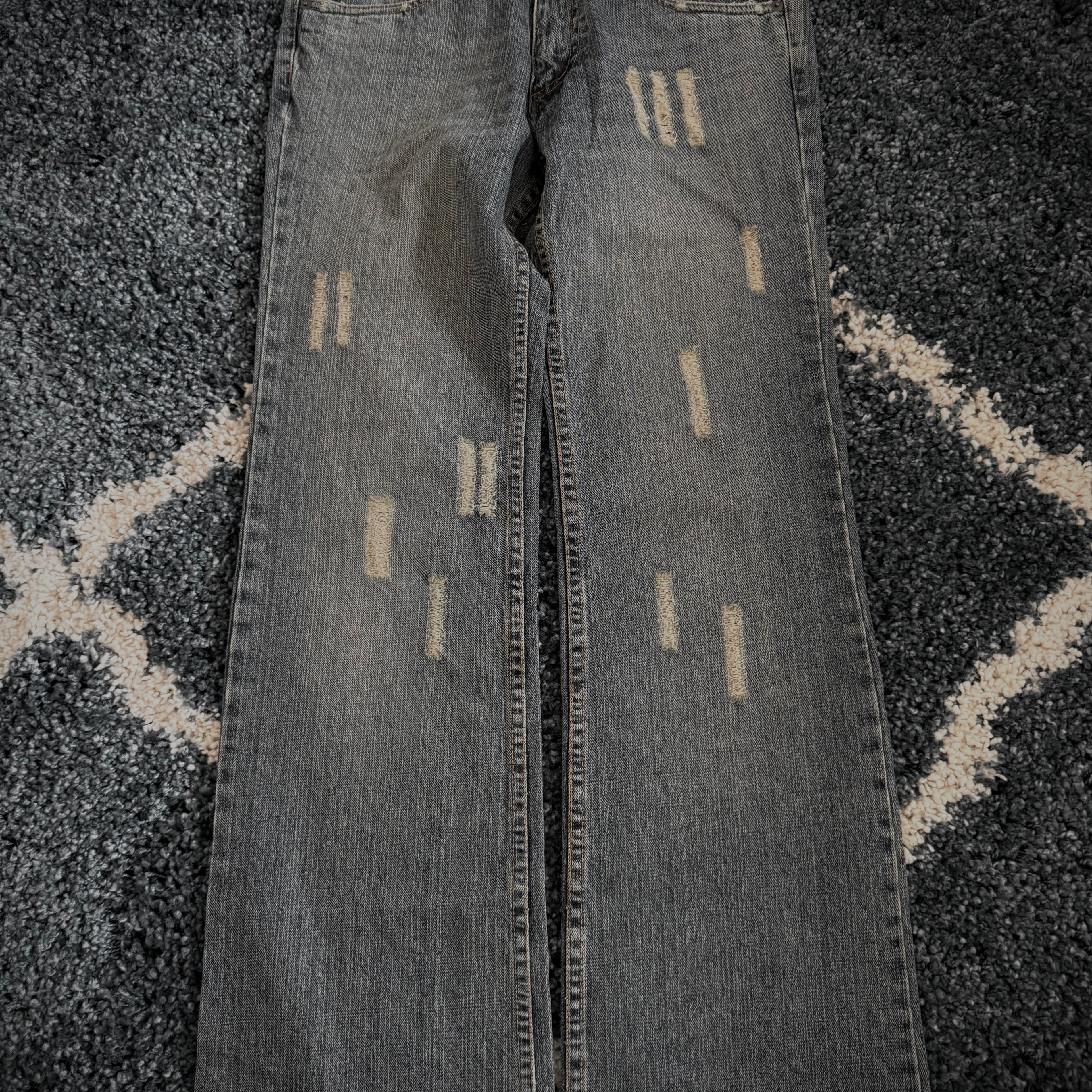 291295 distressed flared denim