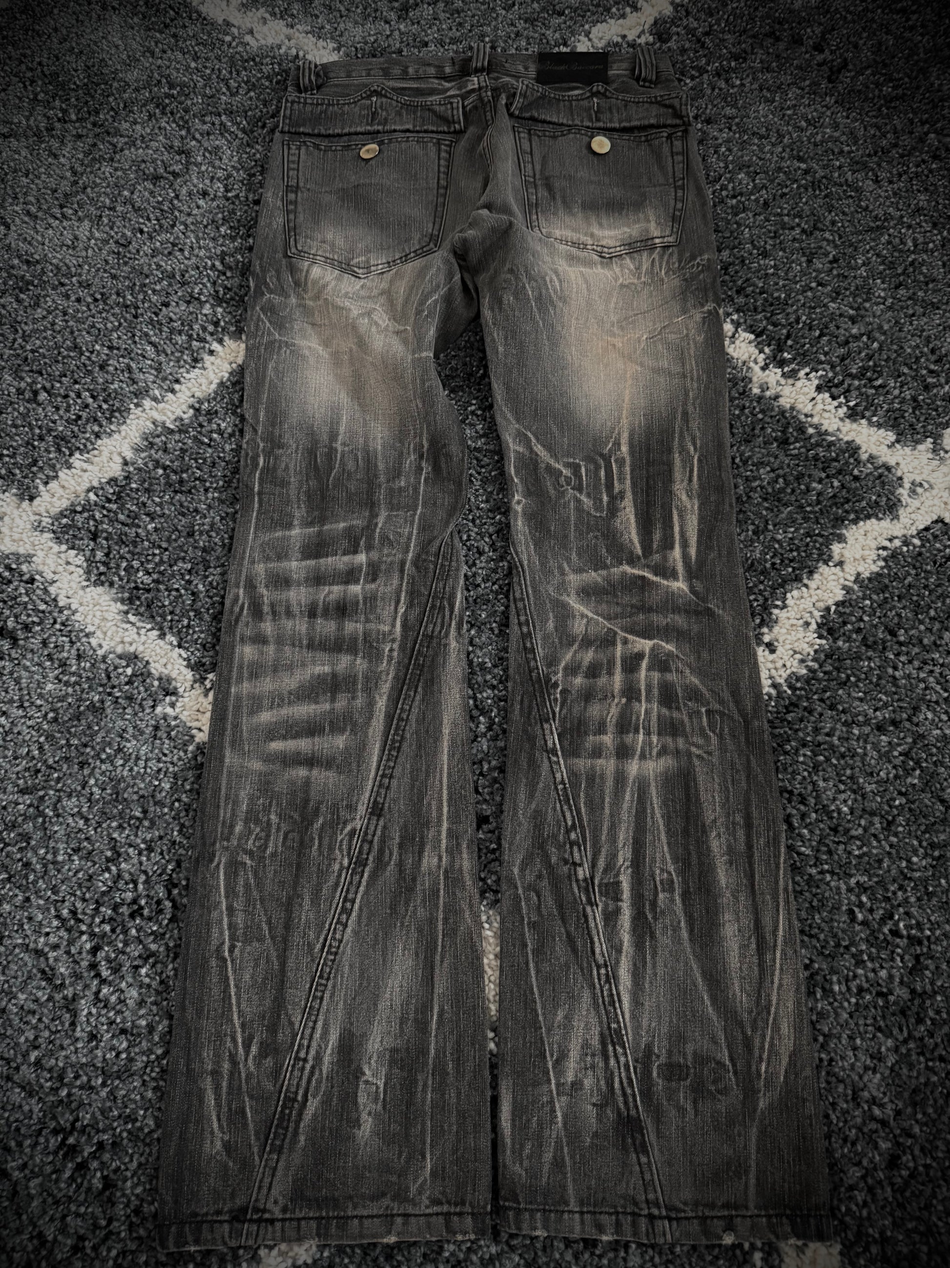 Black Baccara distressed flared denim