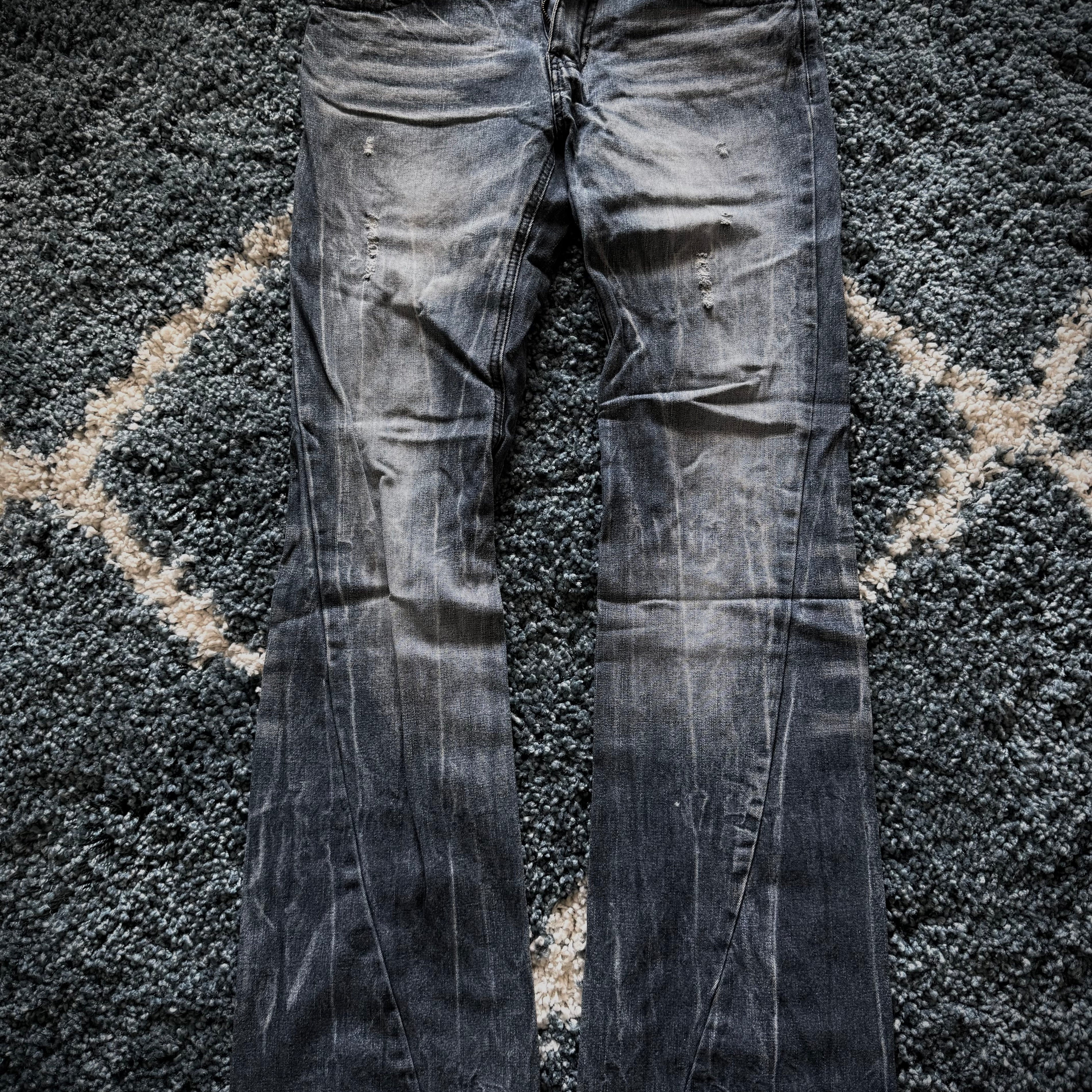 Black Baccara spiral distressed flared denim