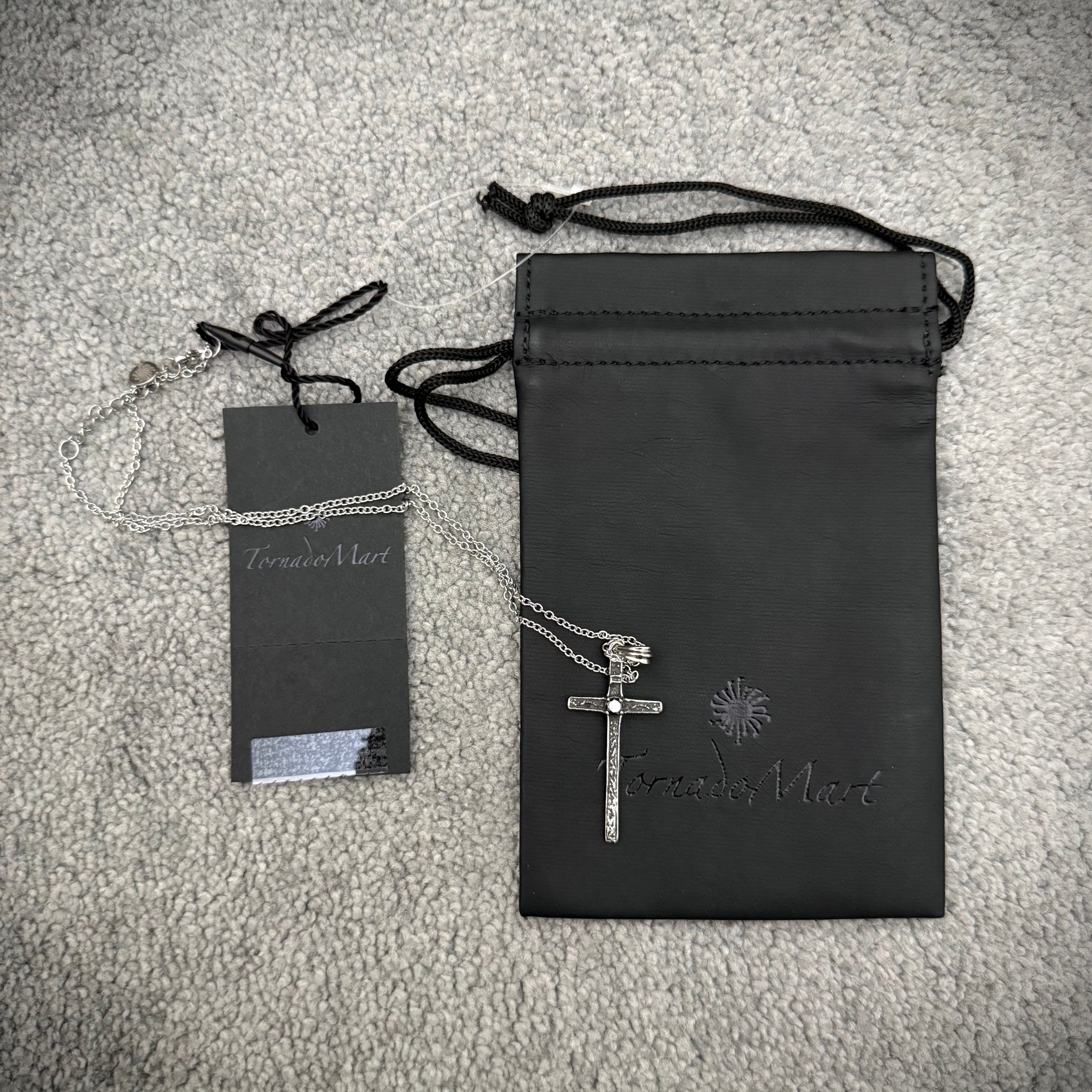 Tornado Mart Phantom cross centered gemstone necklace