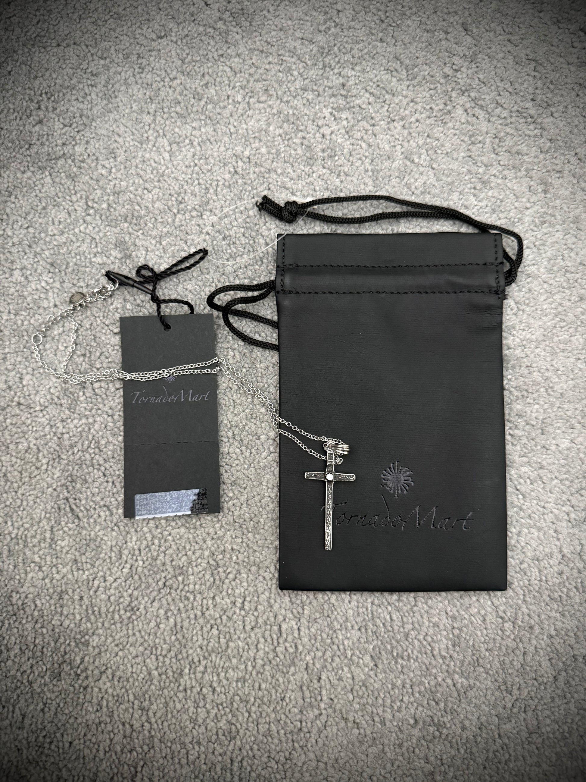 Tornado Mart Phantom cross centered gemstone necklace