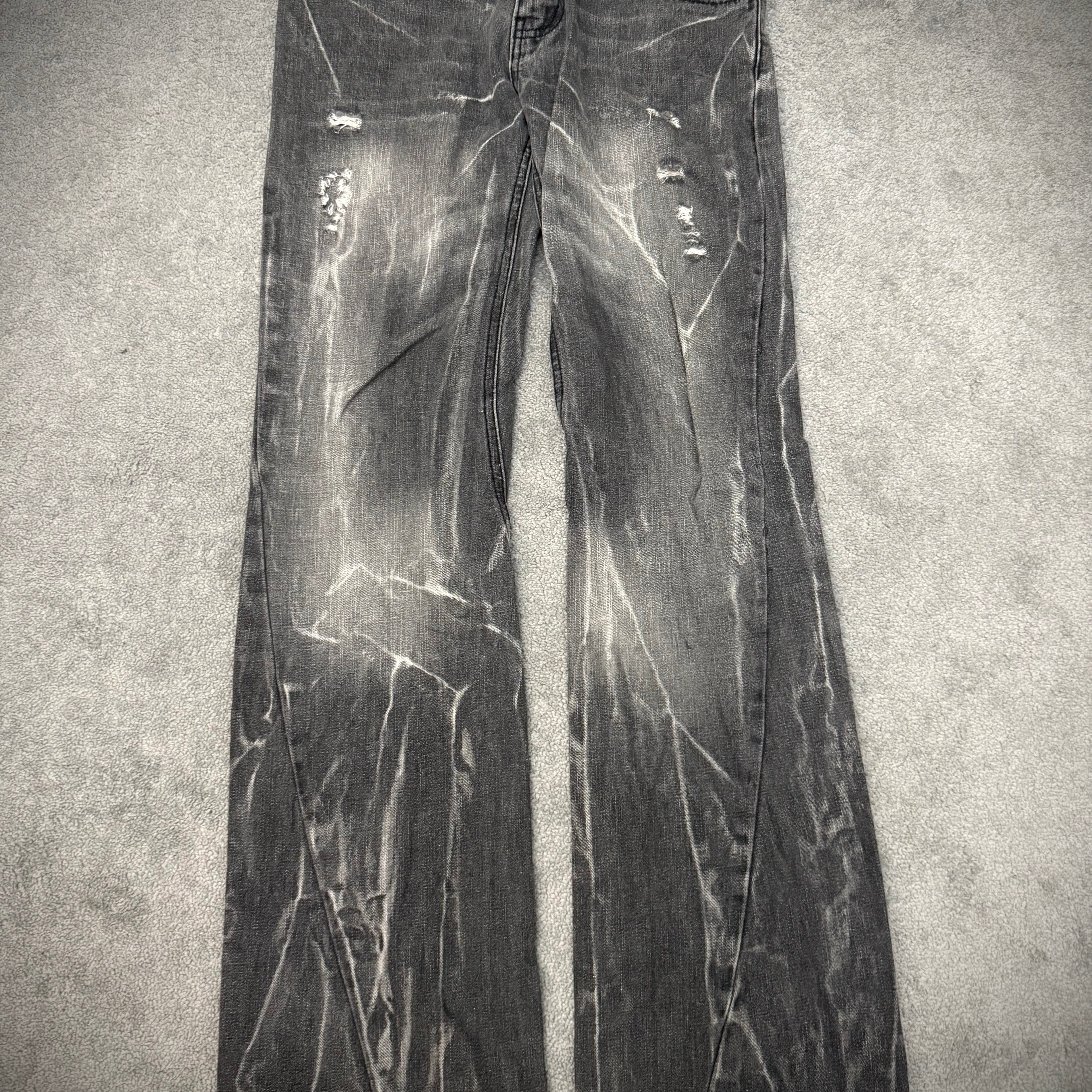 Black Baccara Distressed spiral flared Pants