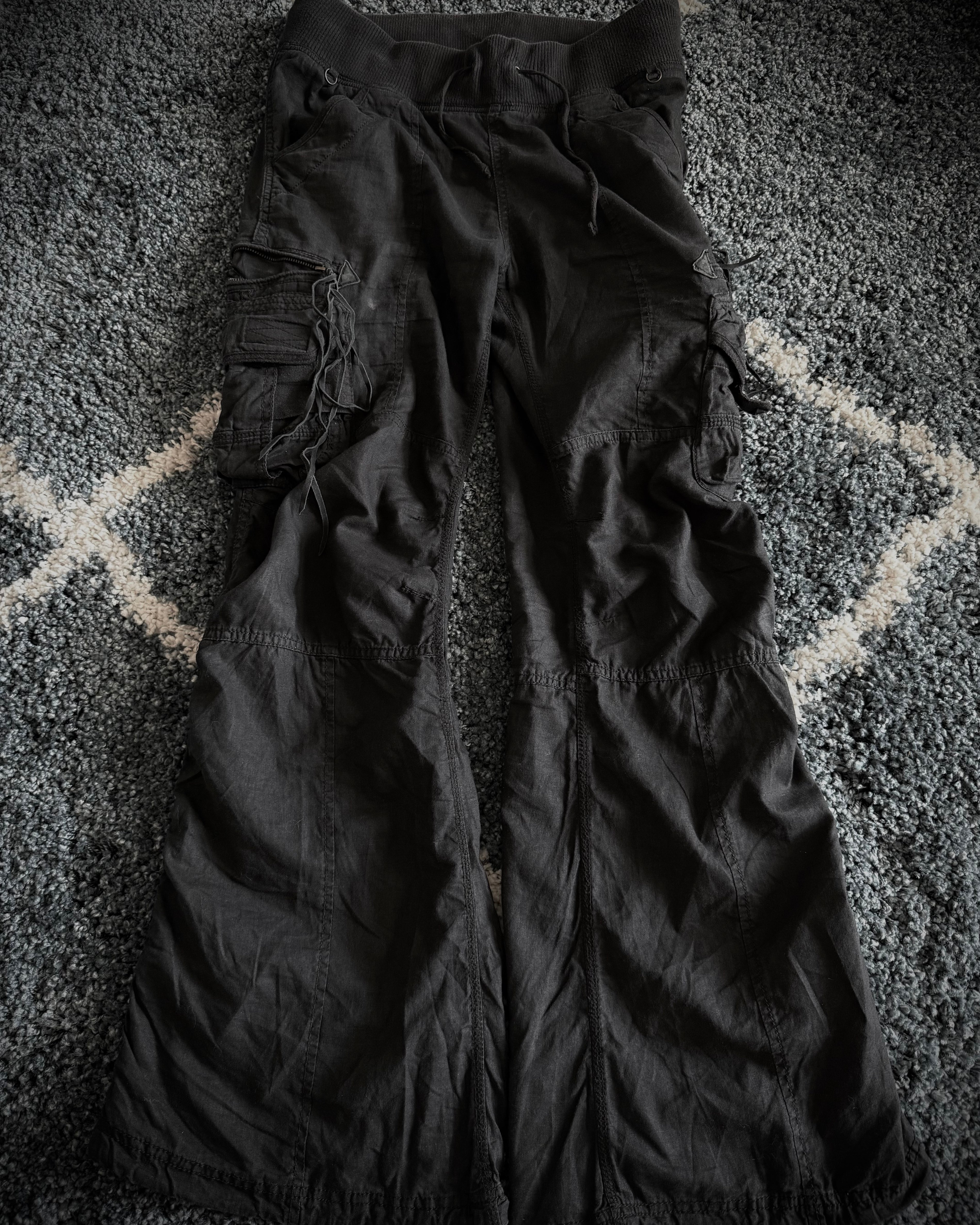 G.O.A Black Leather Tasseled Flared Cargo Pants