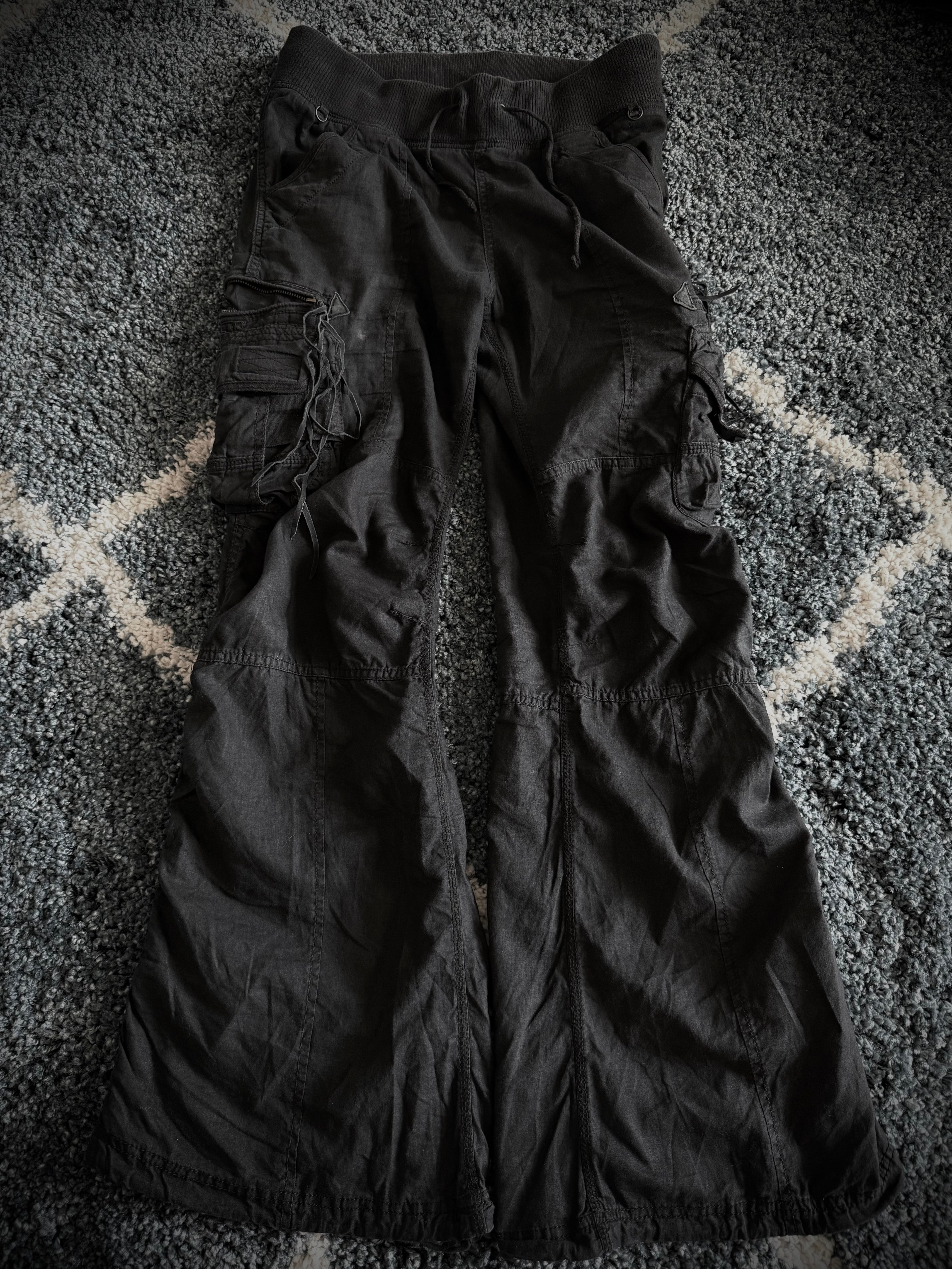 G.O.A Black Leather Tasseled Flared Cargo Pants