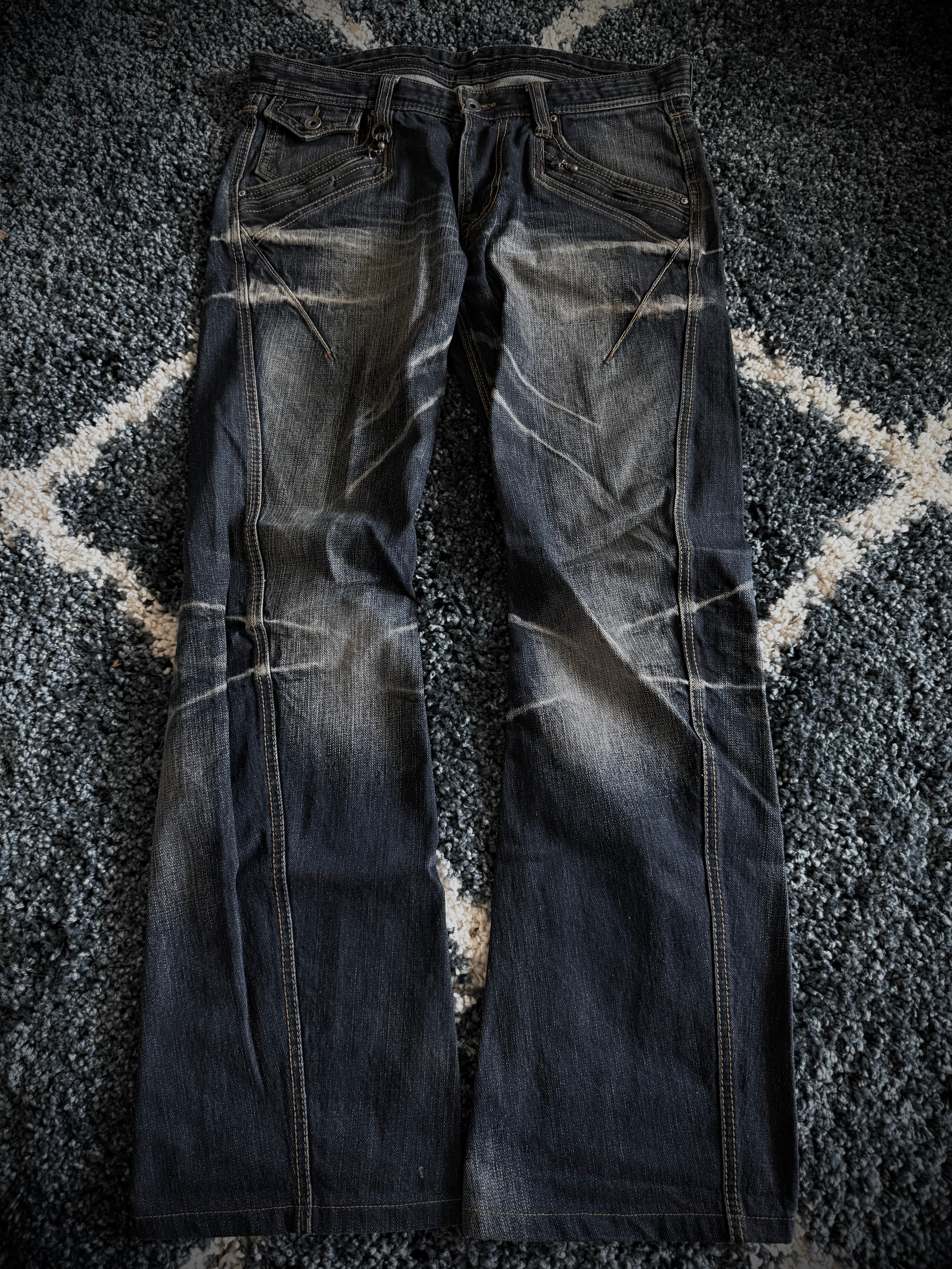 Nicole Club zipp pockets flared denim