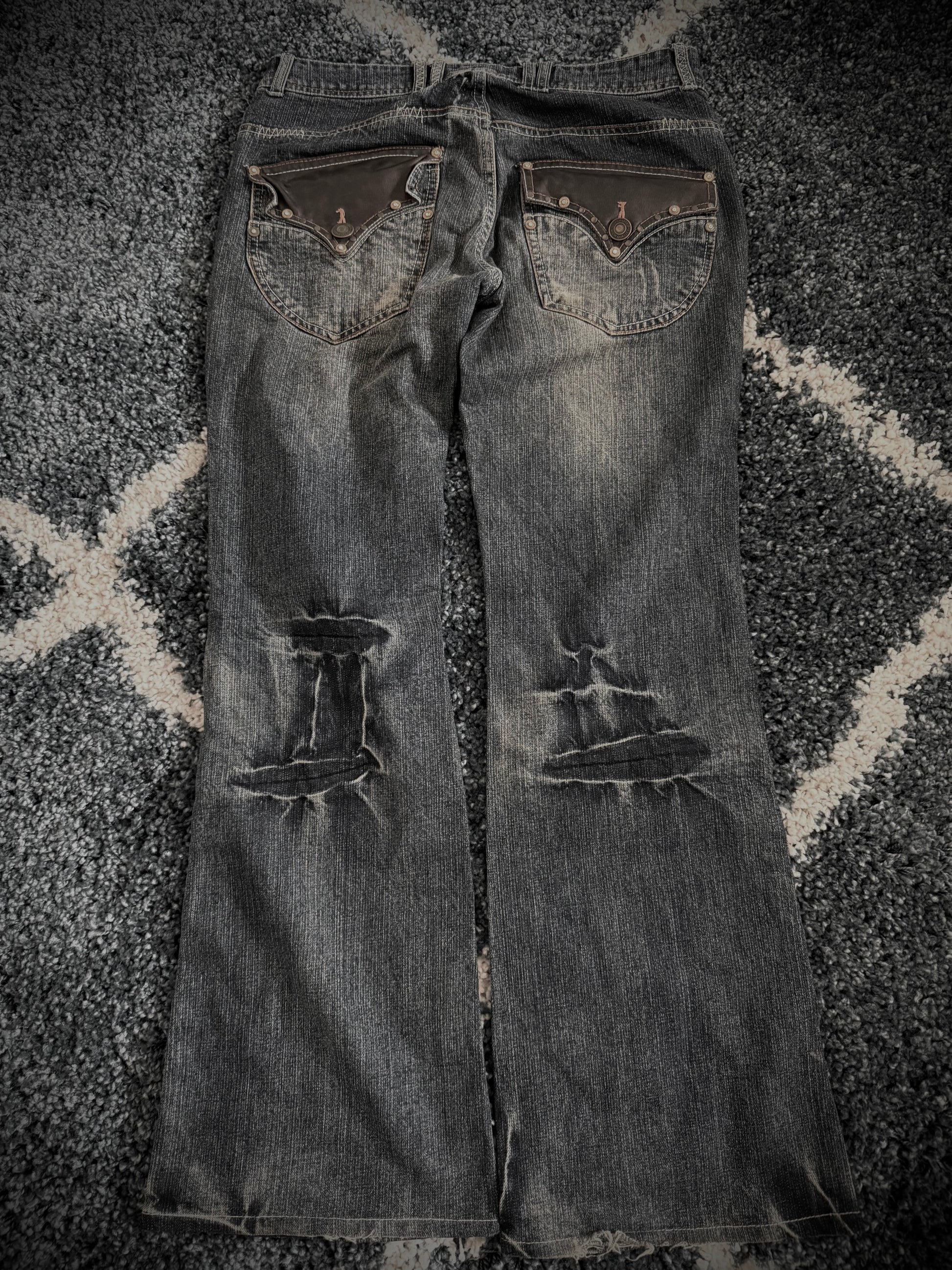 Indecent phantom leather details flared denim