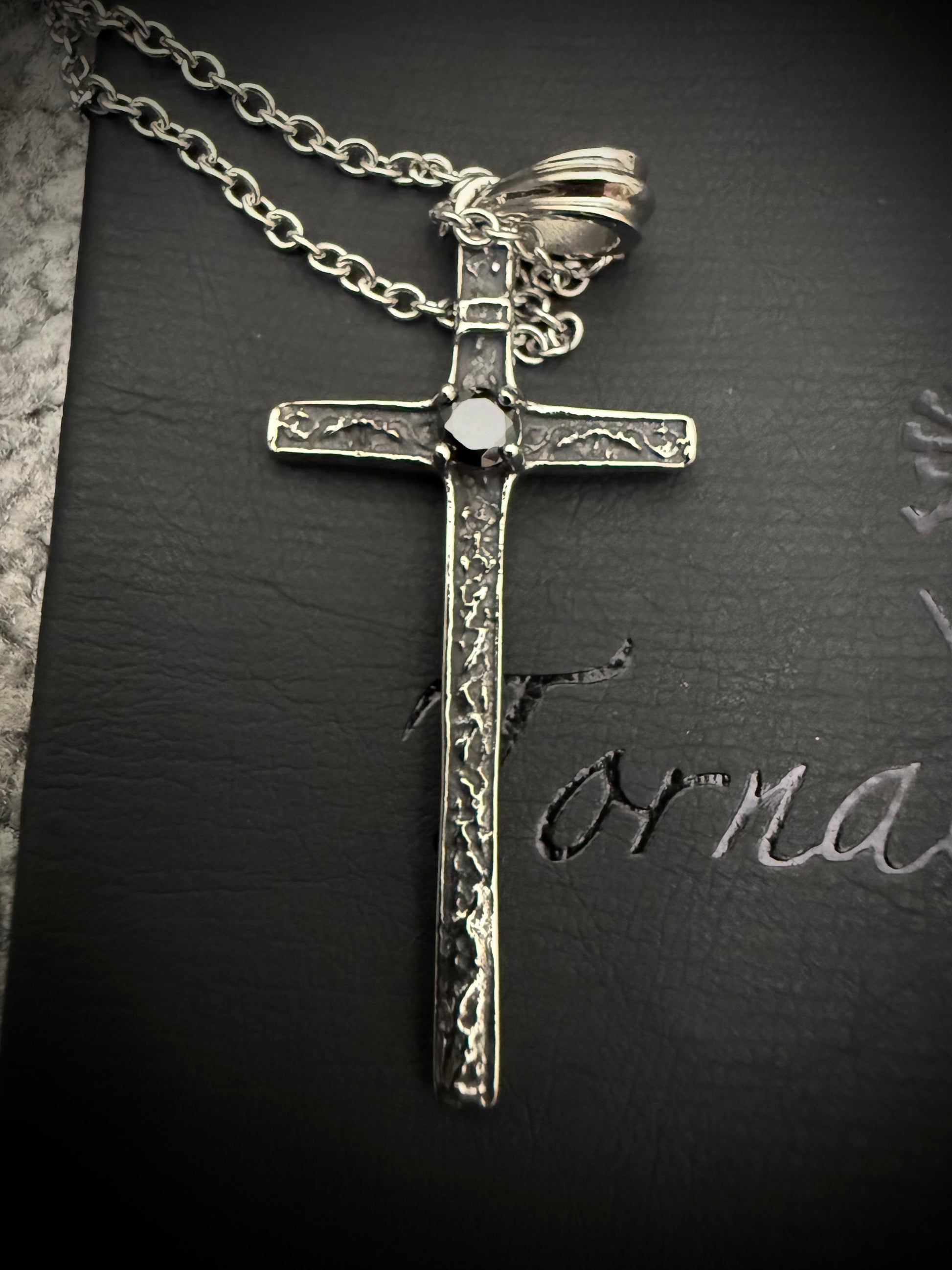 Tornado Mart Phantom cross centered gemstone necklace