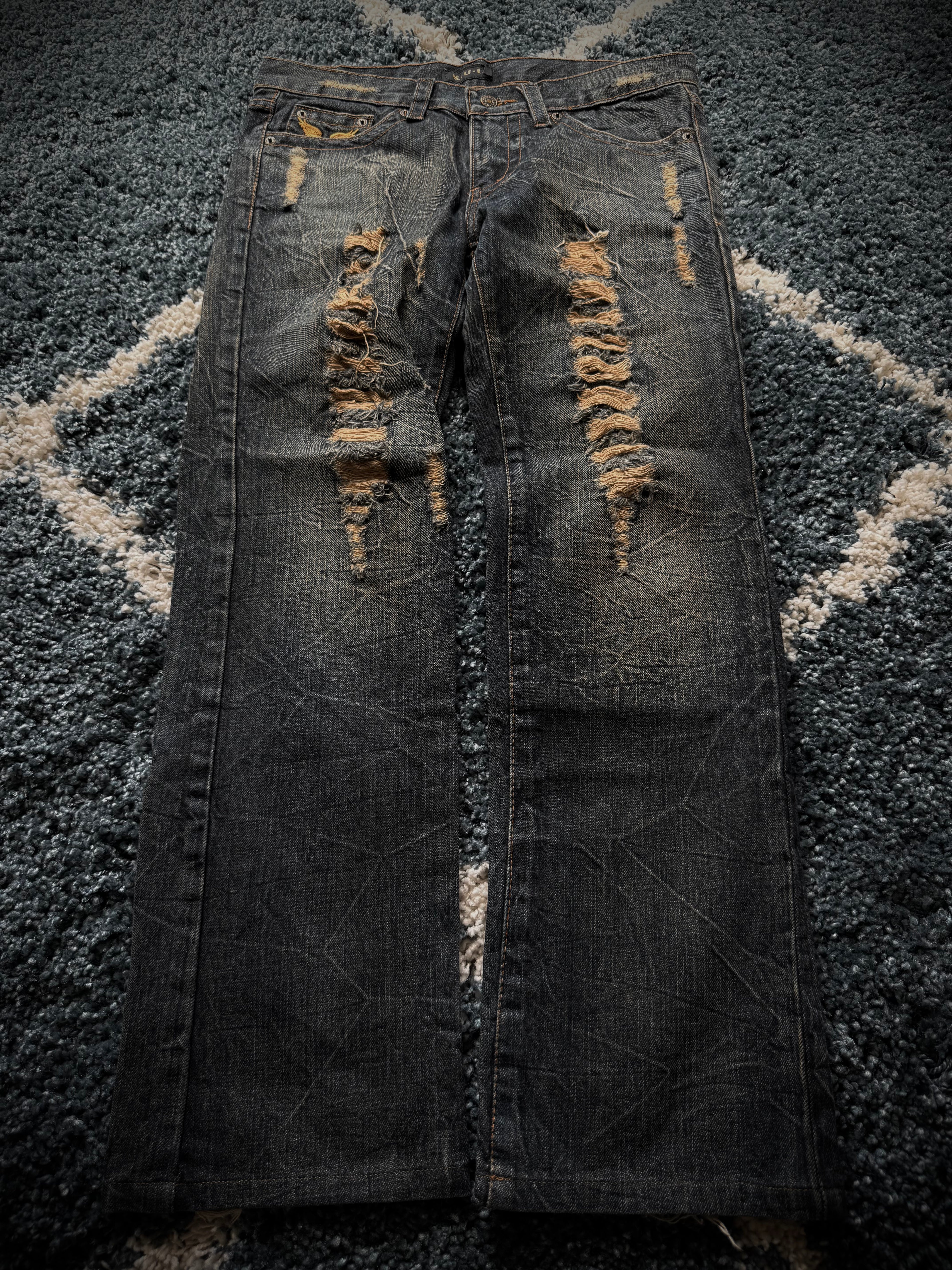 K.U.I Distressed honeycomb flared jeans