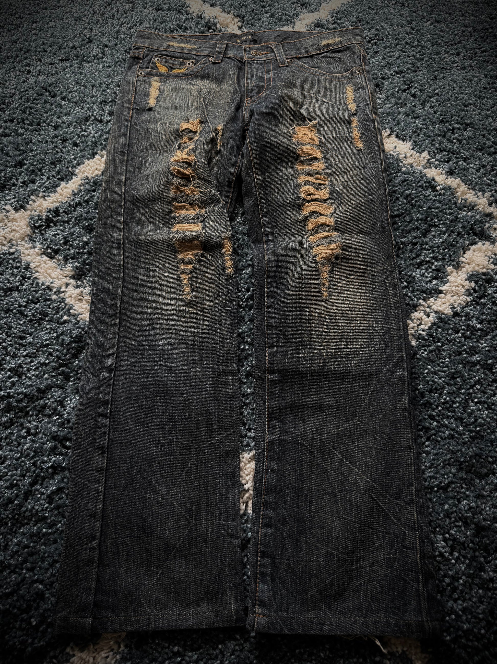 K.U.I Distressed honeycomb flared jeans