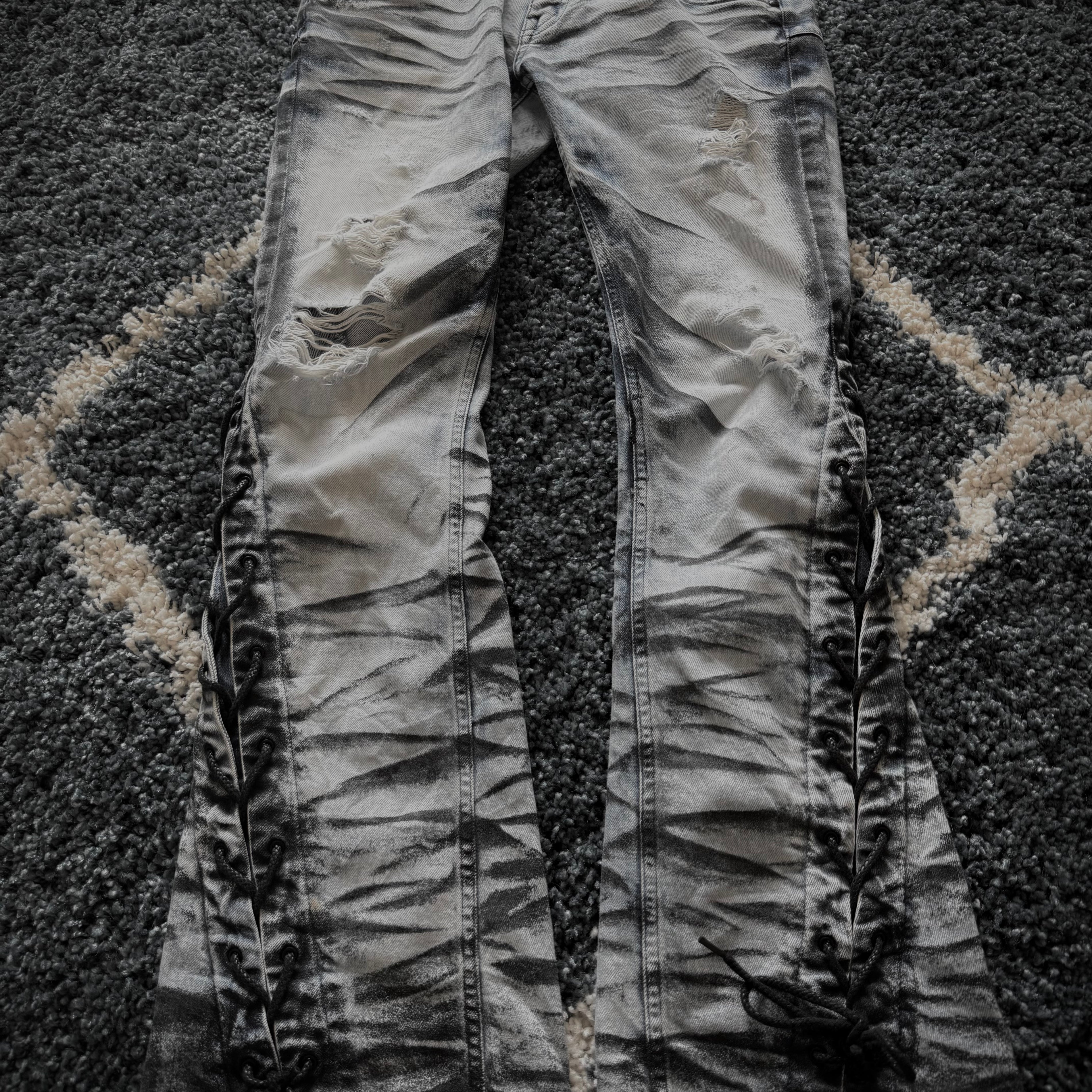 Tornado Mart Zebra laced up spiral flared jeans