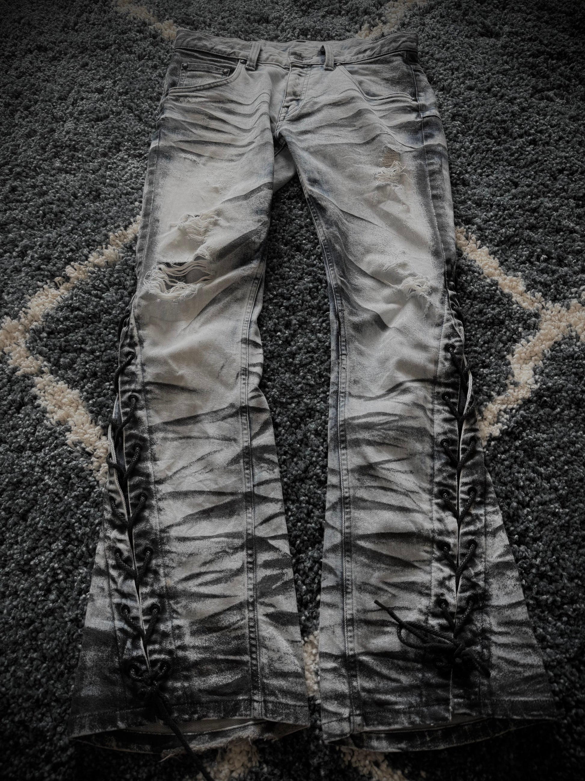 Tornado Mart Zebra laced up spiral flared jeans
