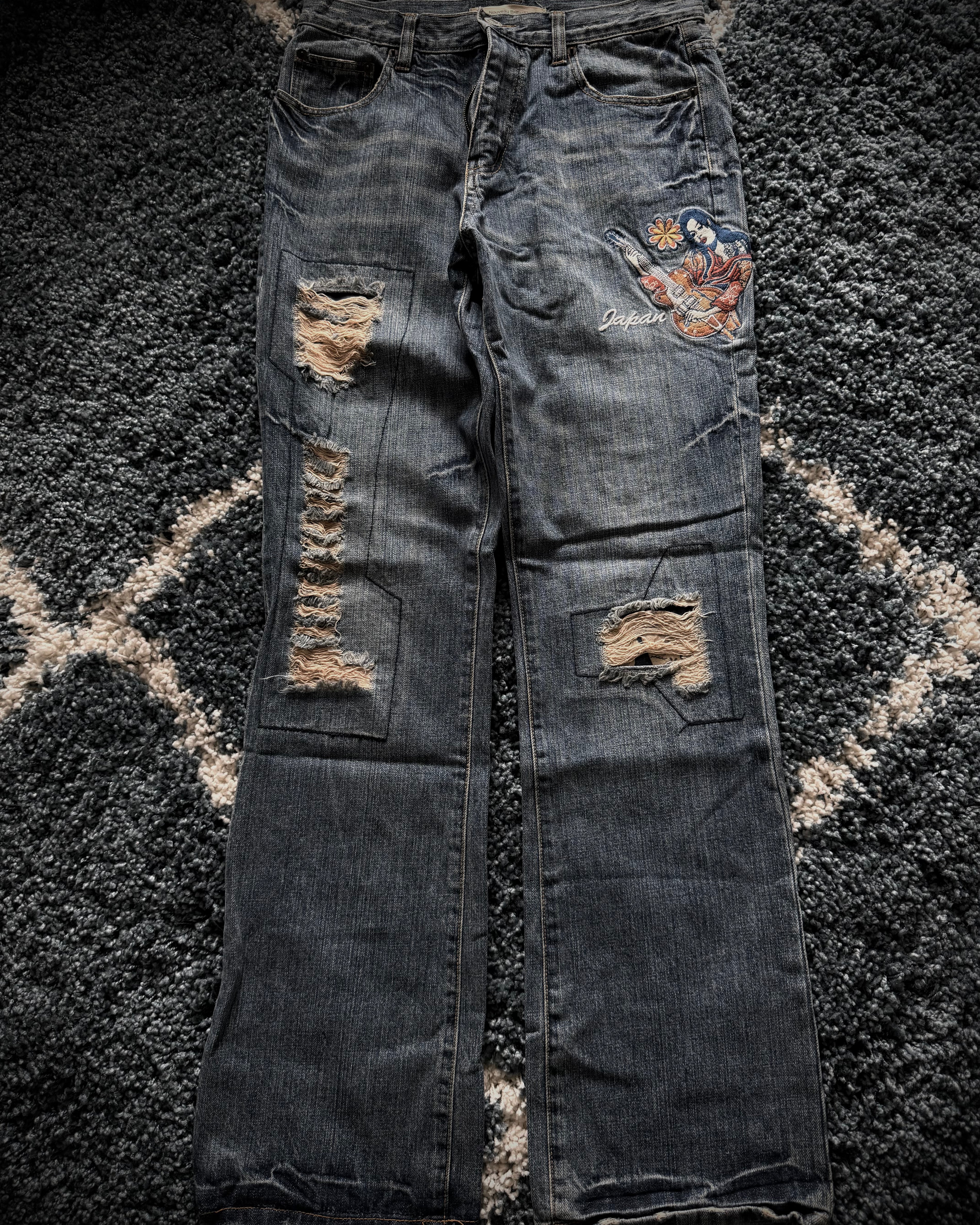 Noveu HOMME Japan distressed flared denim