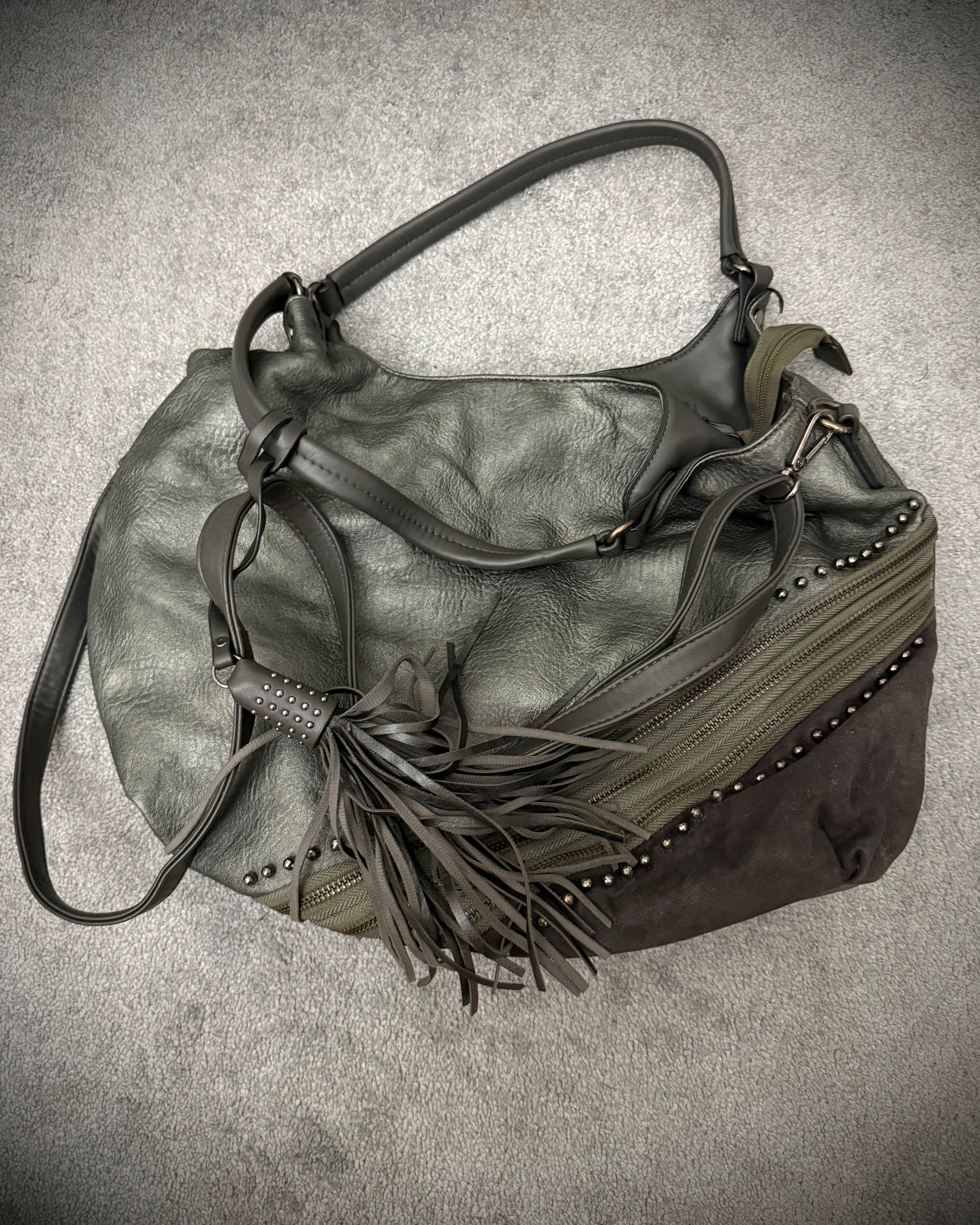 MUTANT tripple zipper studded tassels leather bag