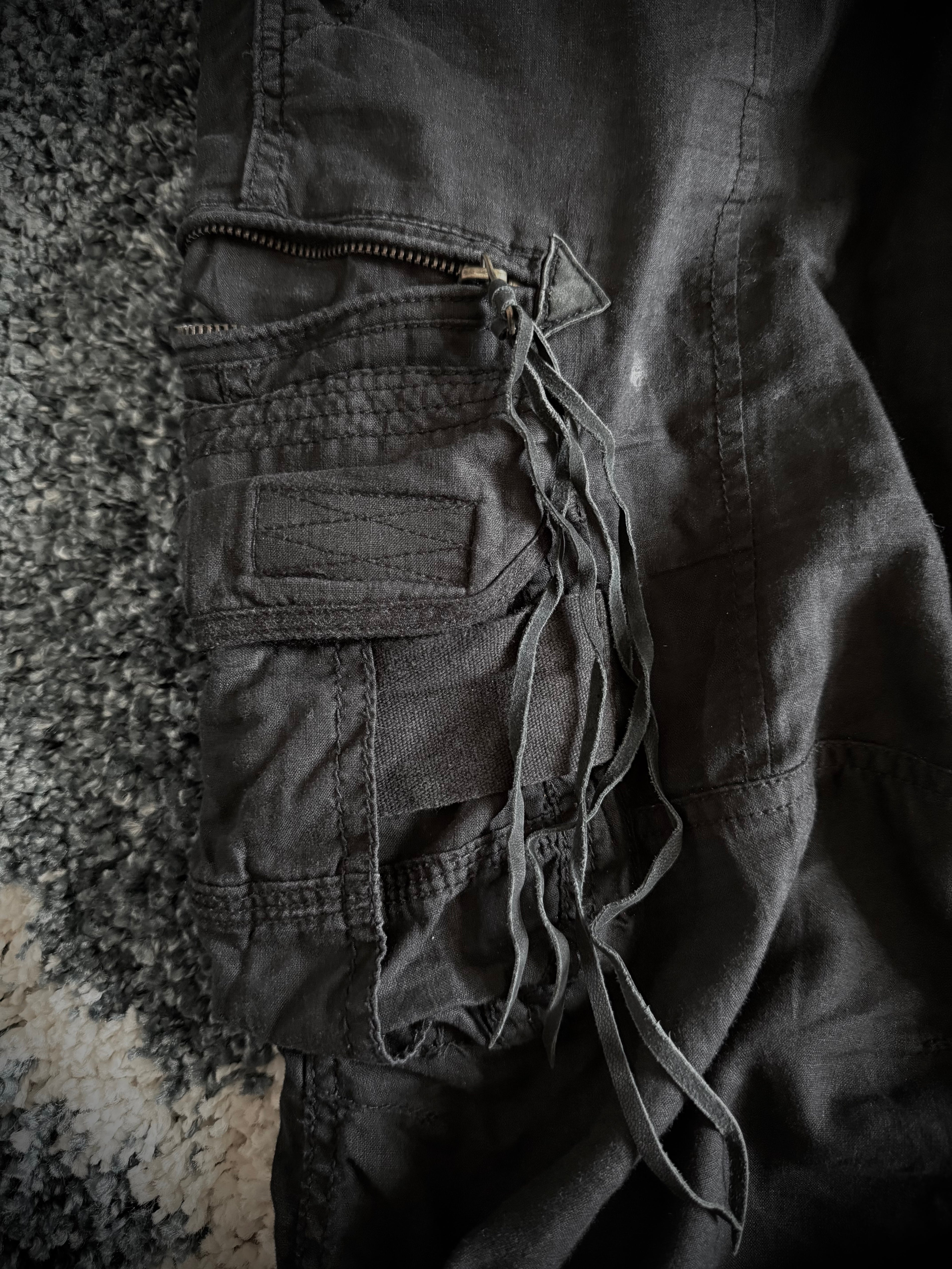 G.O.A Black Leather Tasseled Flared Cargo Pants