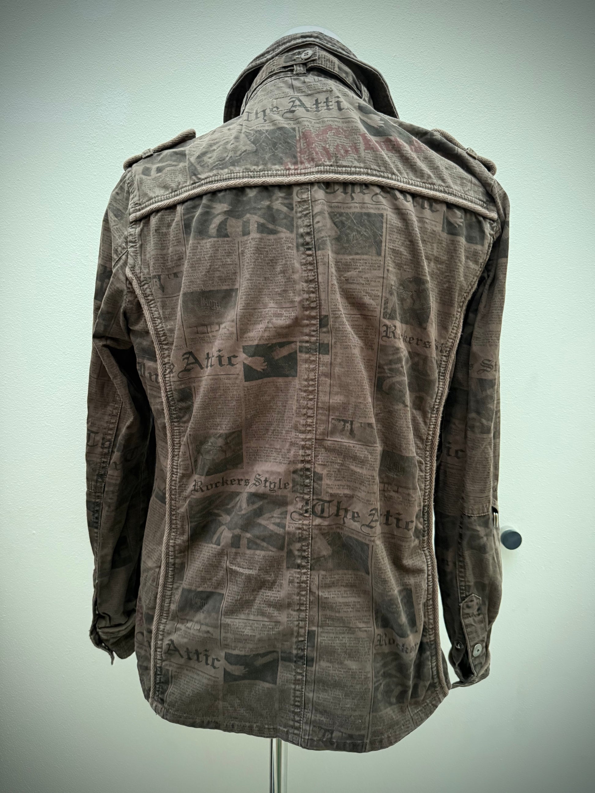 In the attic newspaper jacket