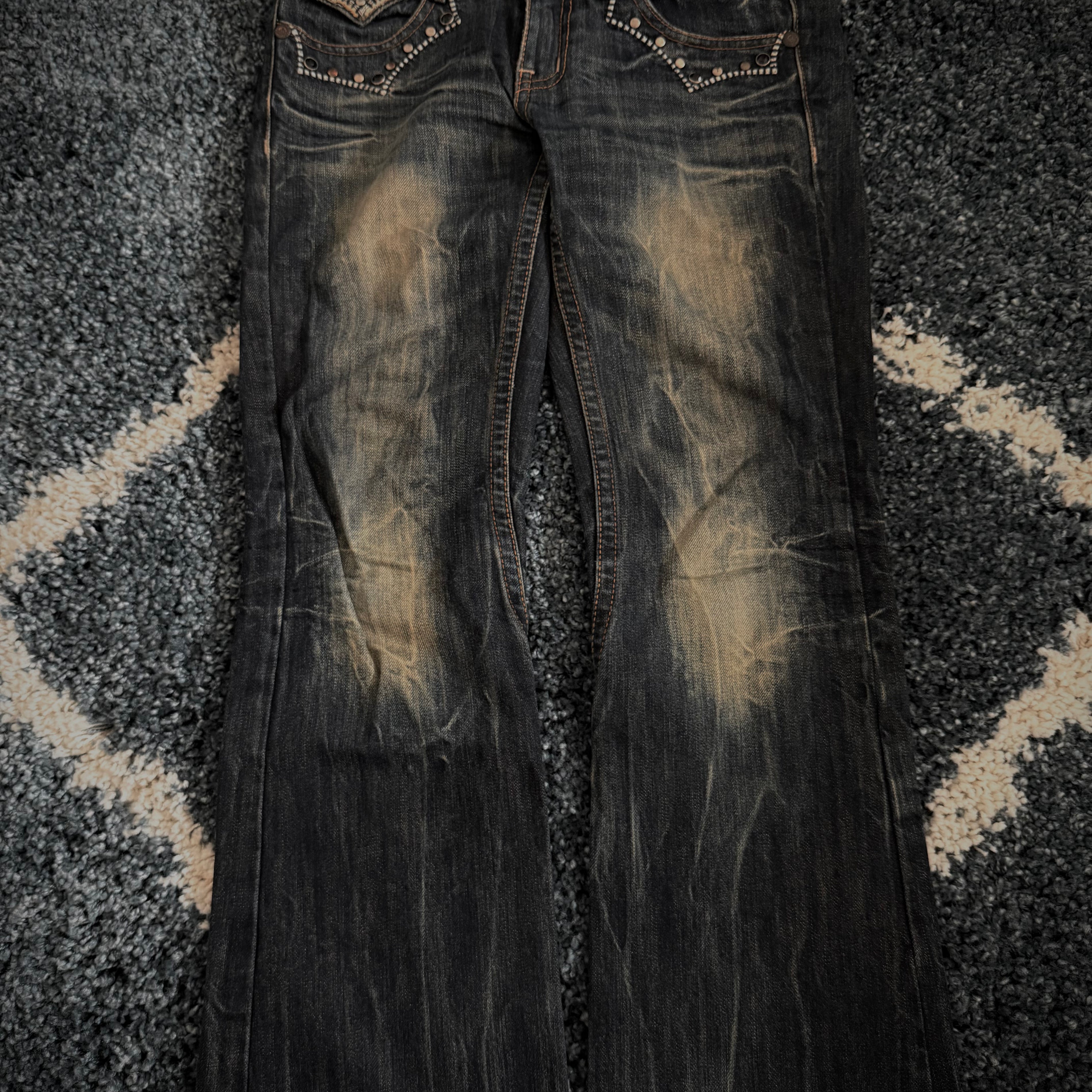 Red Pepper Mud Washed studded skull flared denim