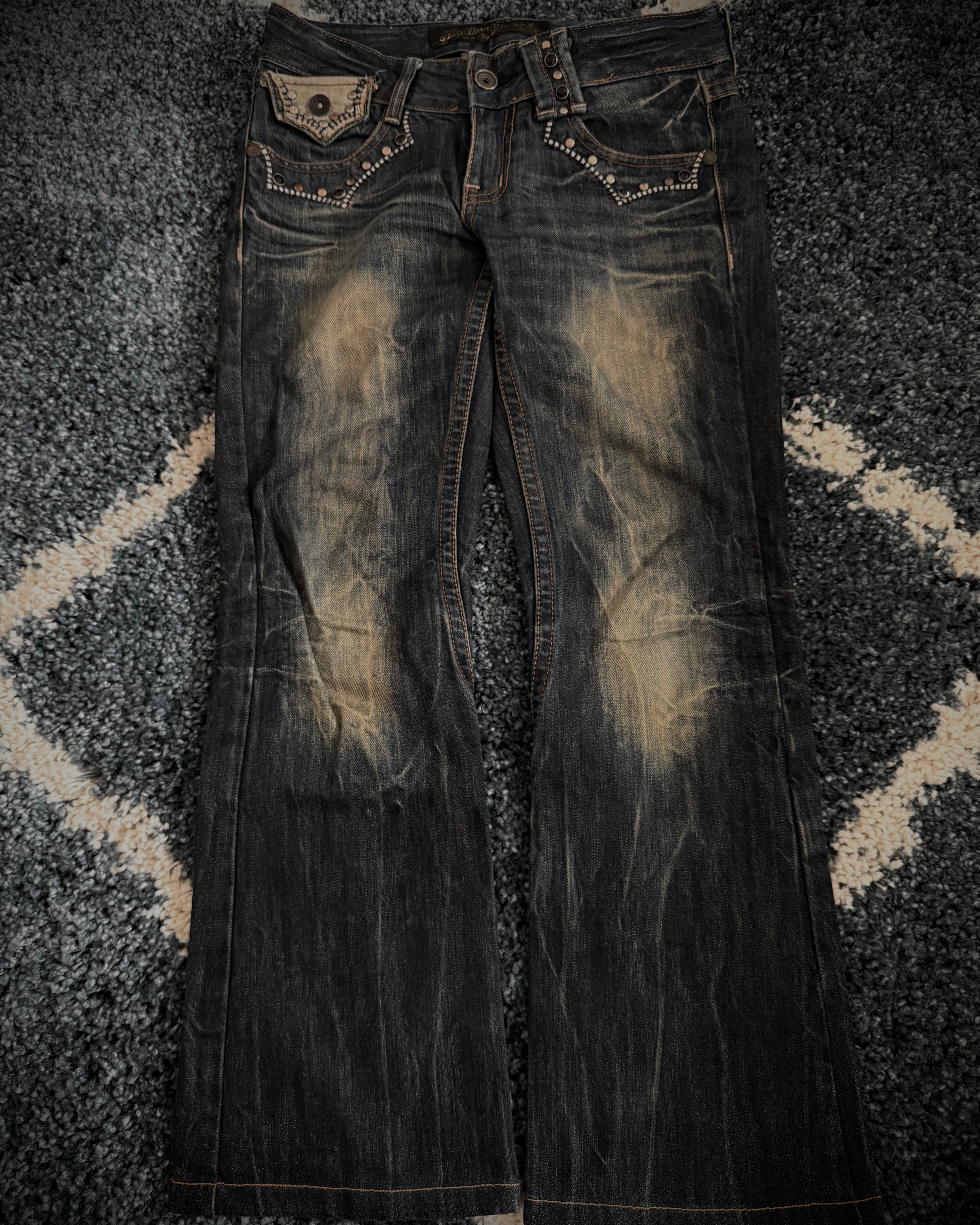 Red Pepper Mud Washed studded skull flared denim