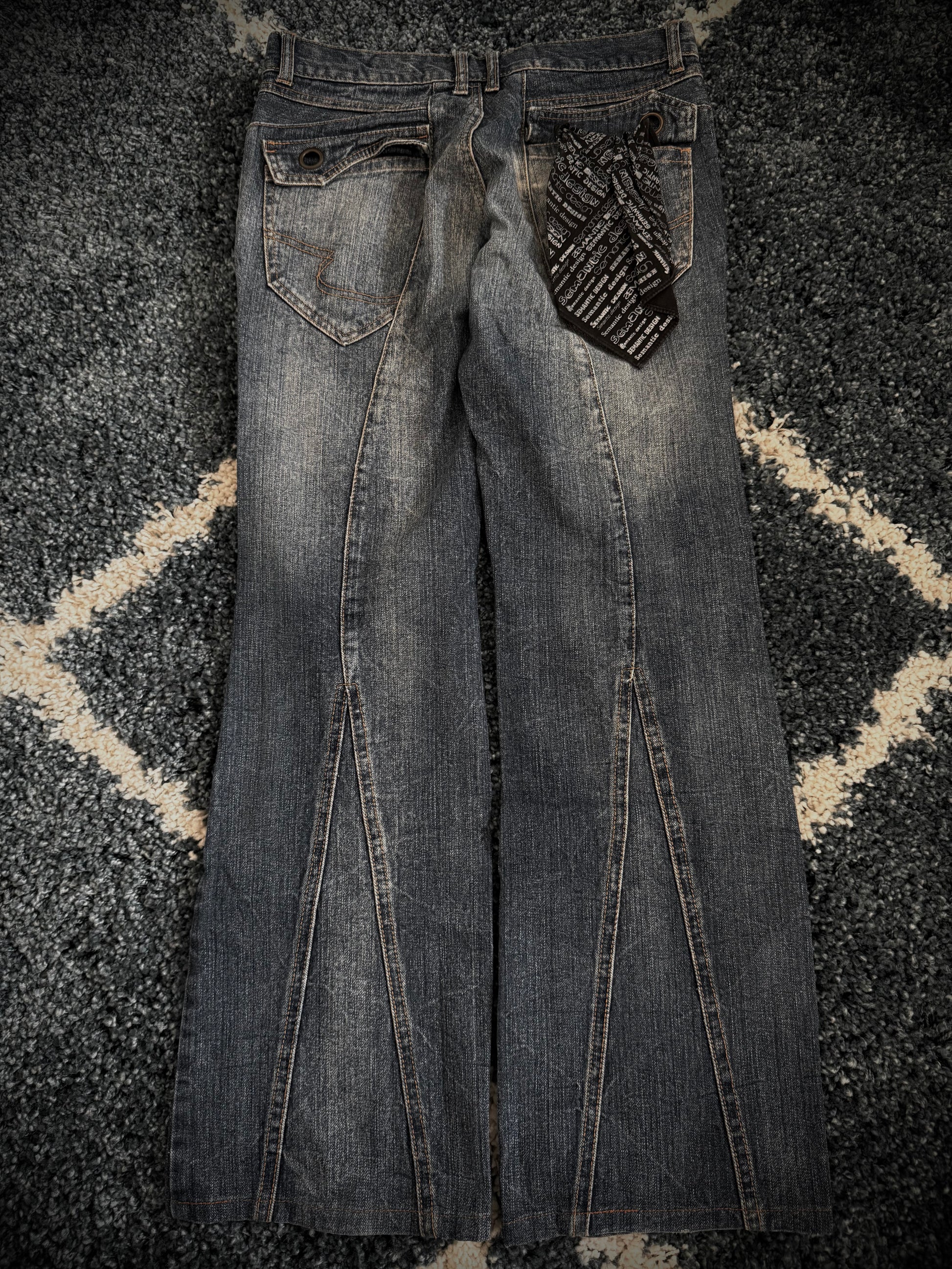 Semantic Design Spiral flared denim