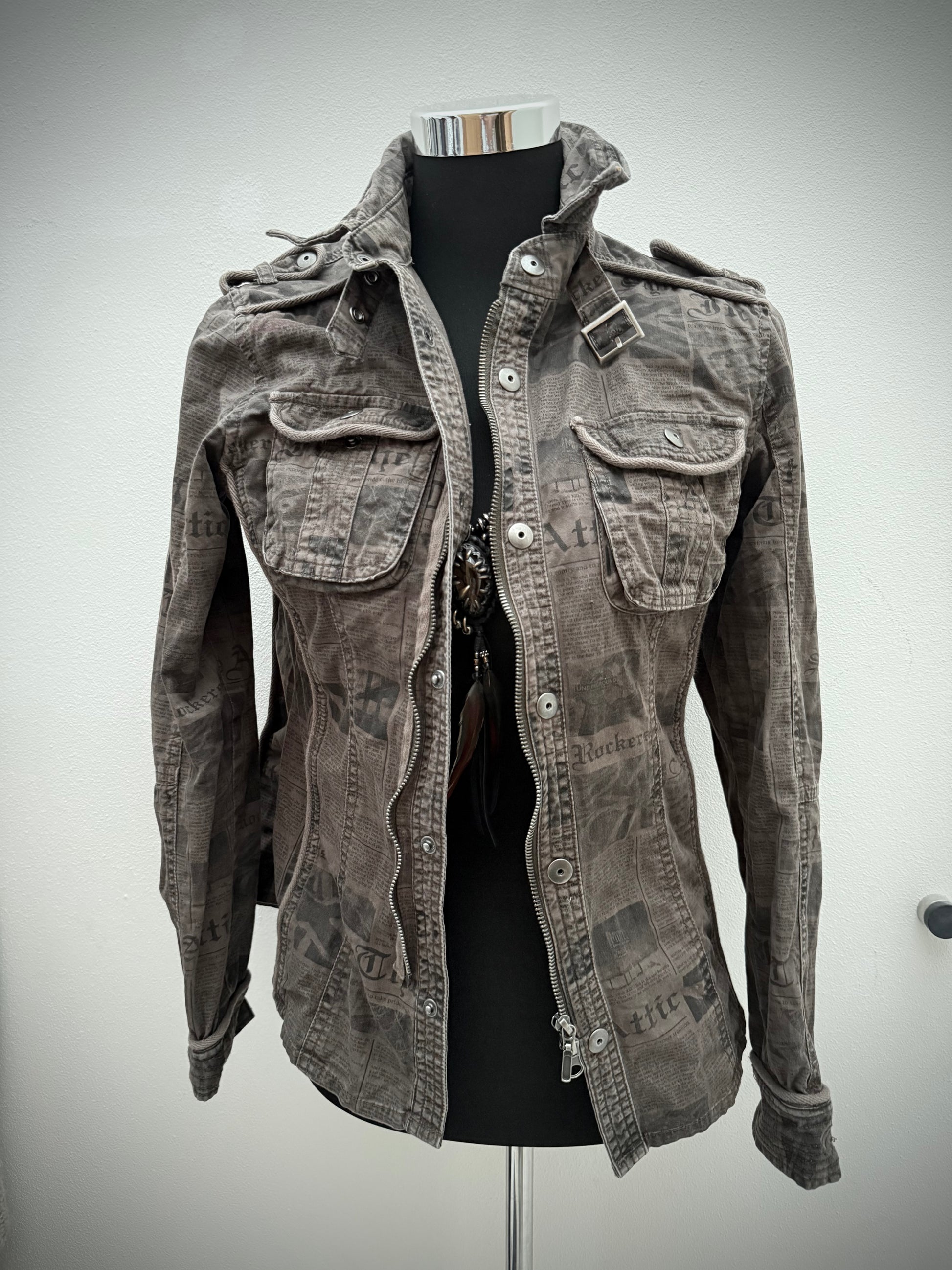 In the attic newspaper jacket