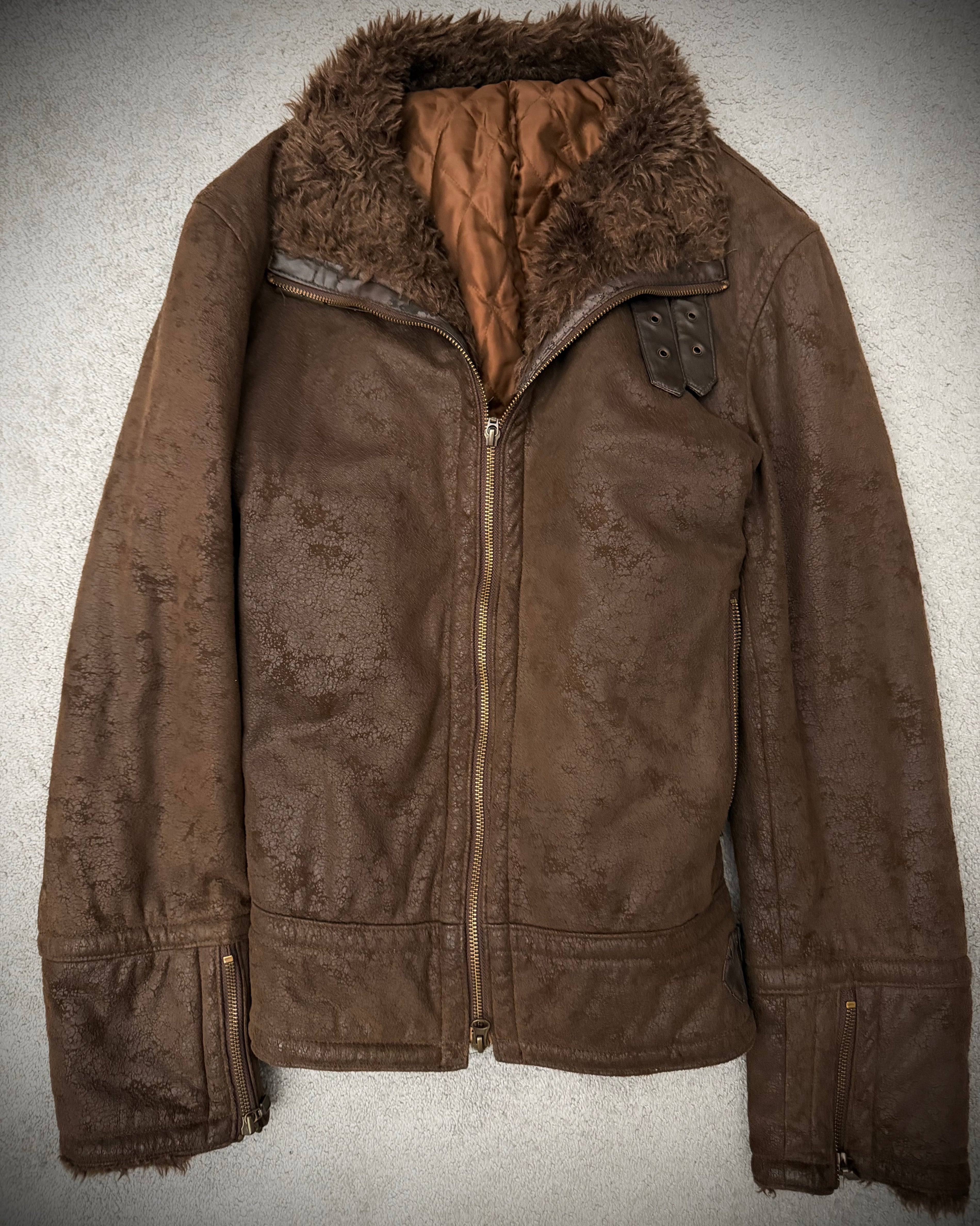 Tornado Mart 00‘s belted cracked waxed fur jacket