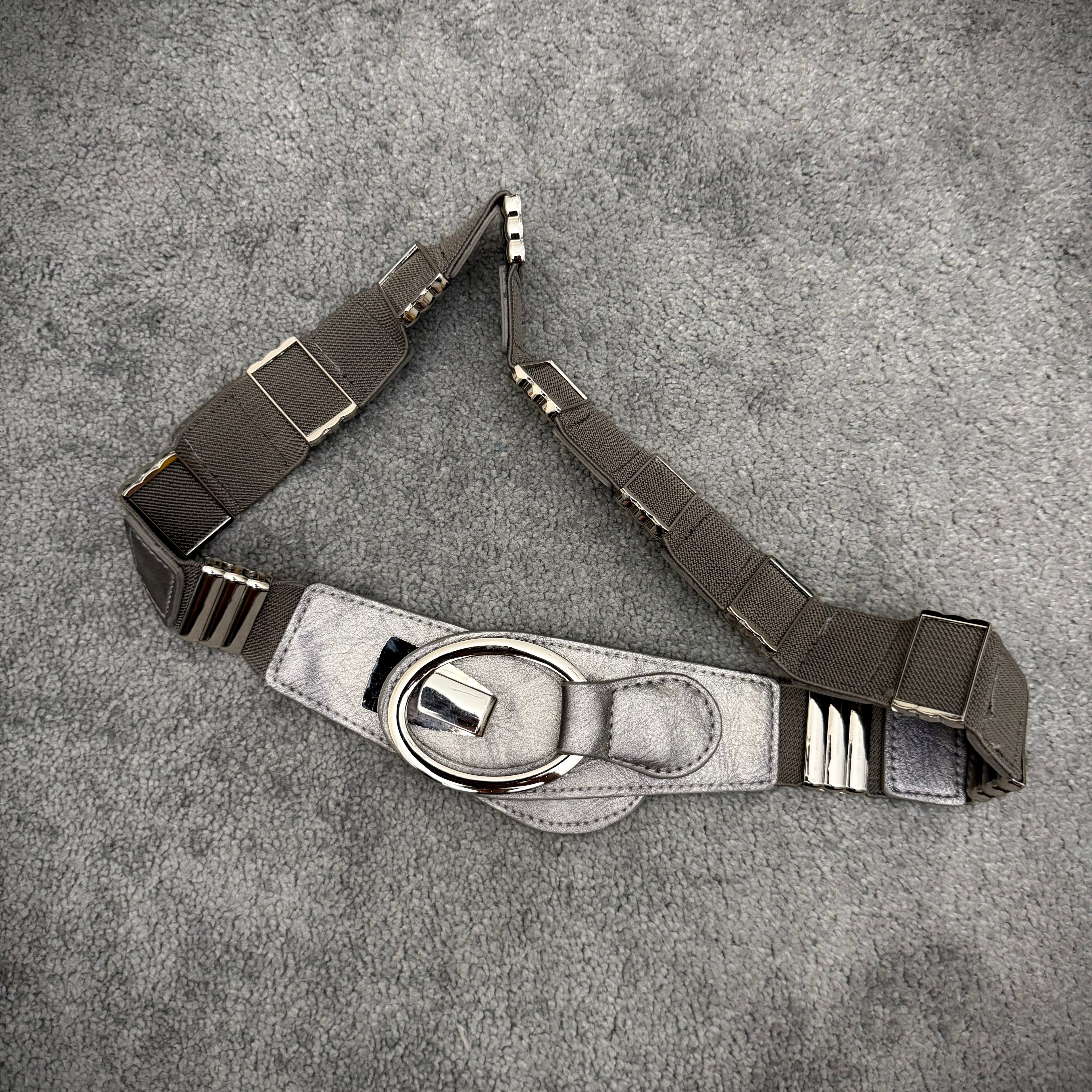 Metallic override belt