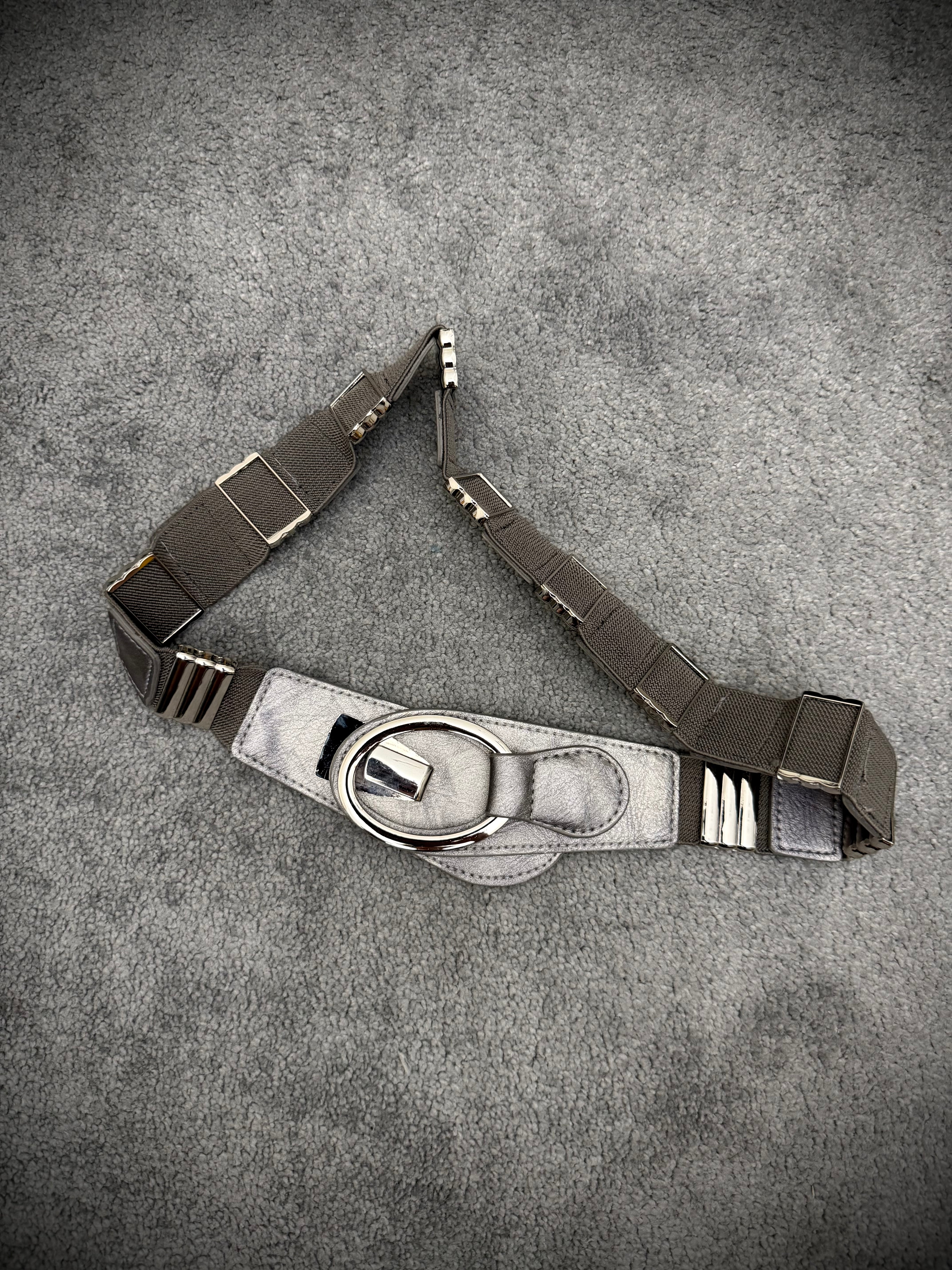 Metallic override belt