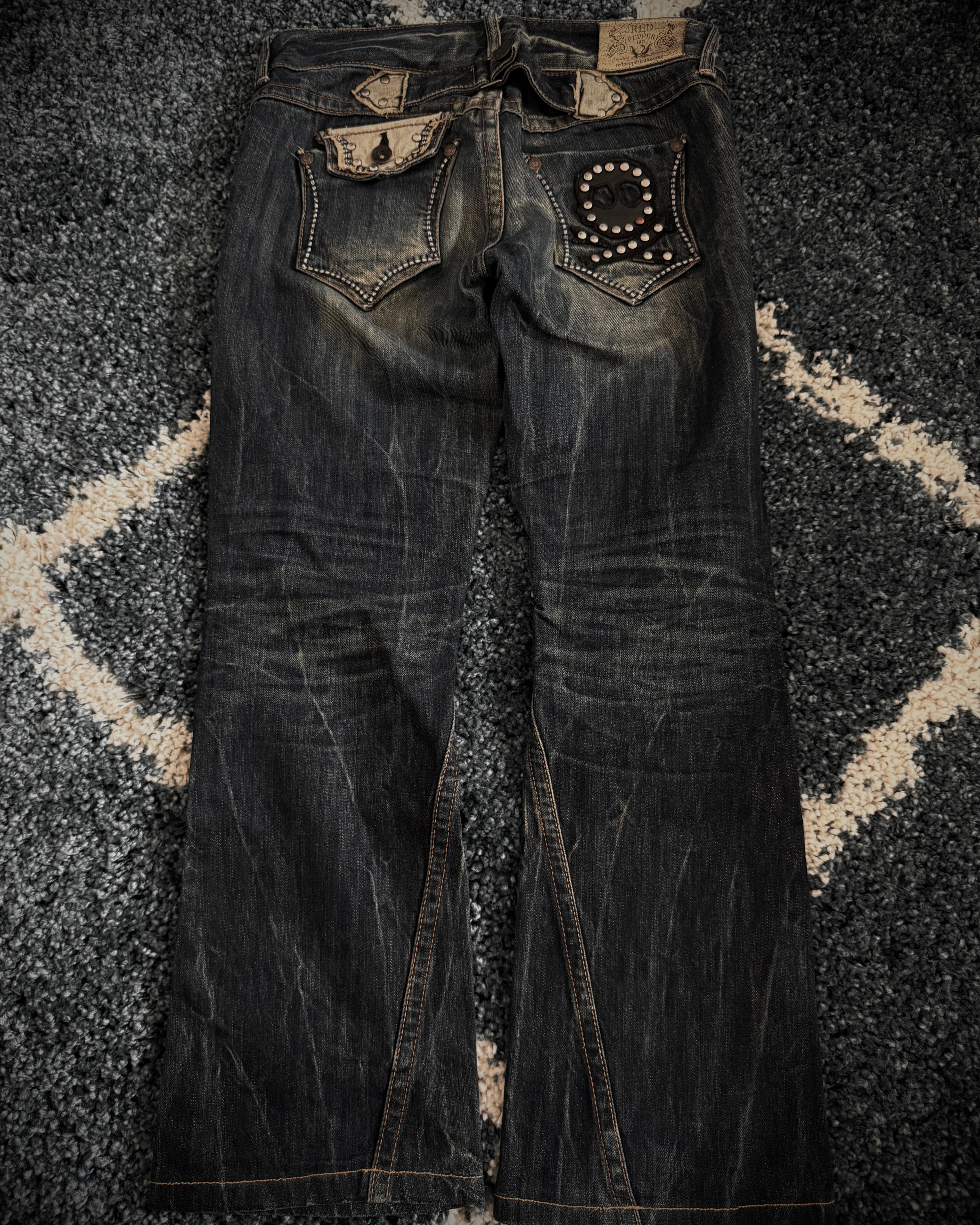 Red Pepper Mud Washed studded skull flared denim