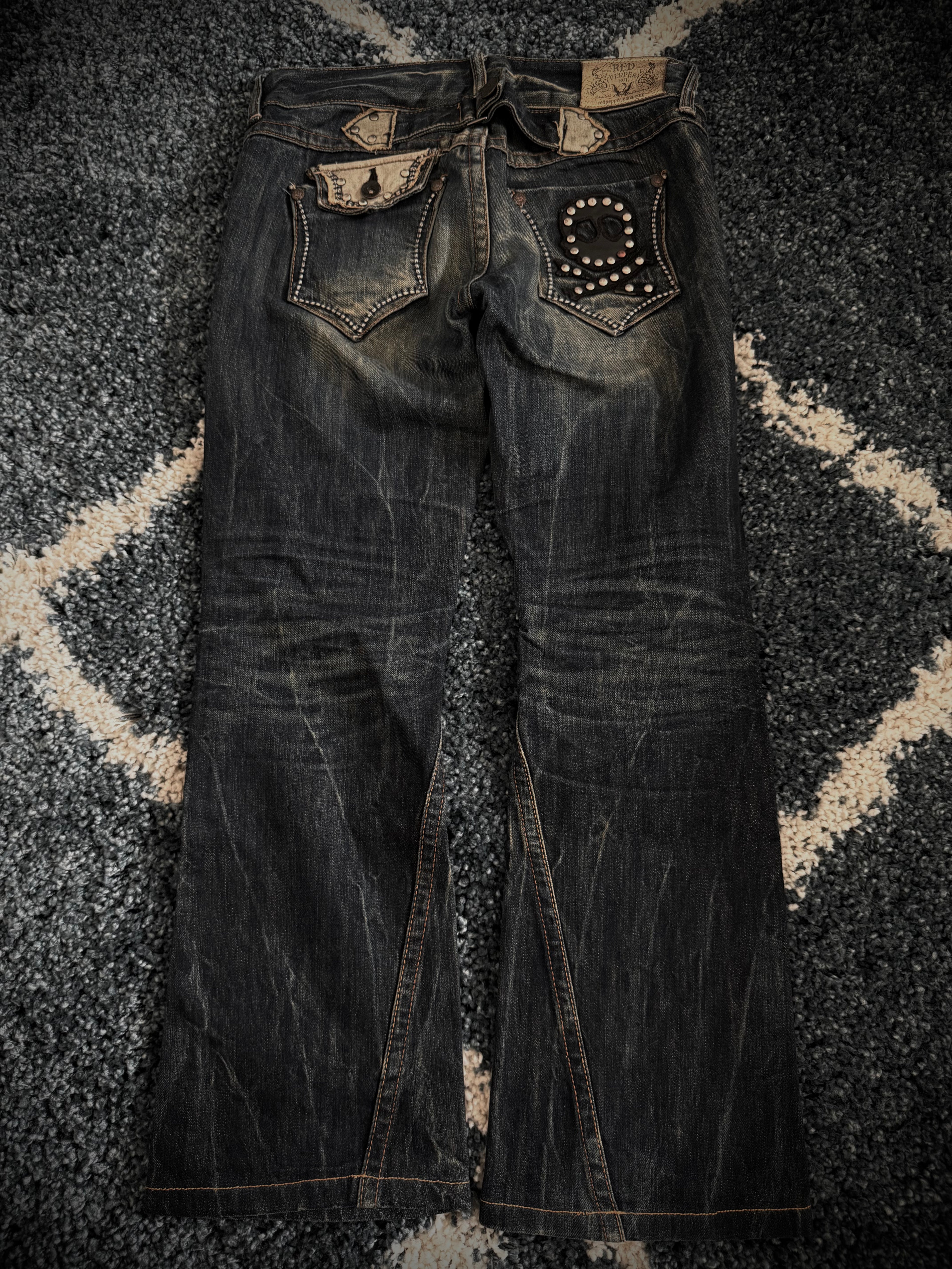 Red Pepper Mud Washed studded skull flared denim