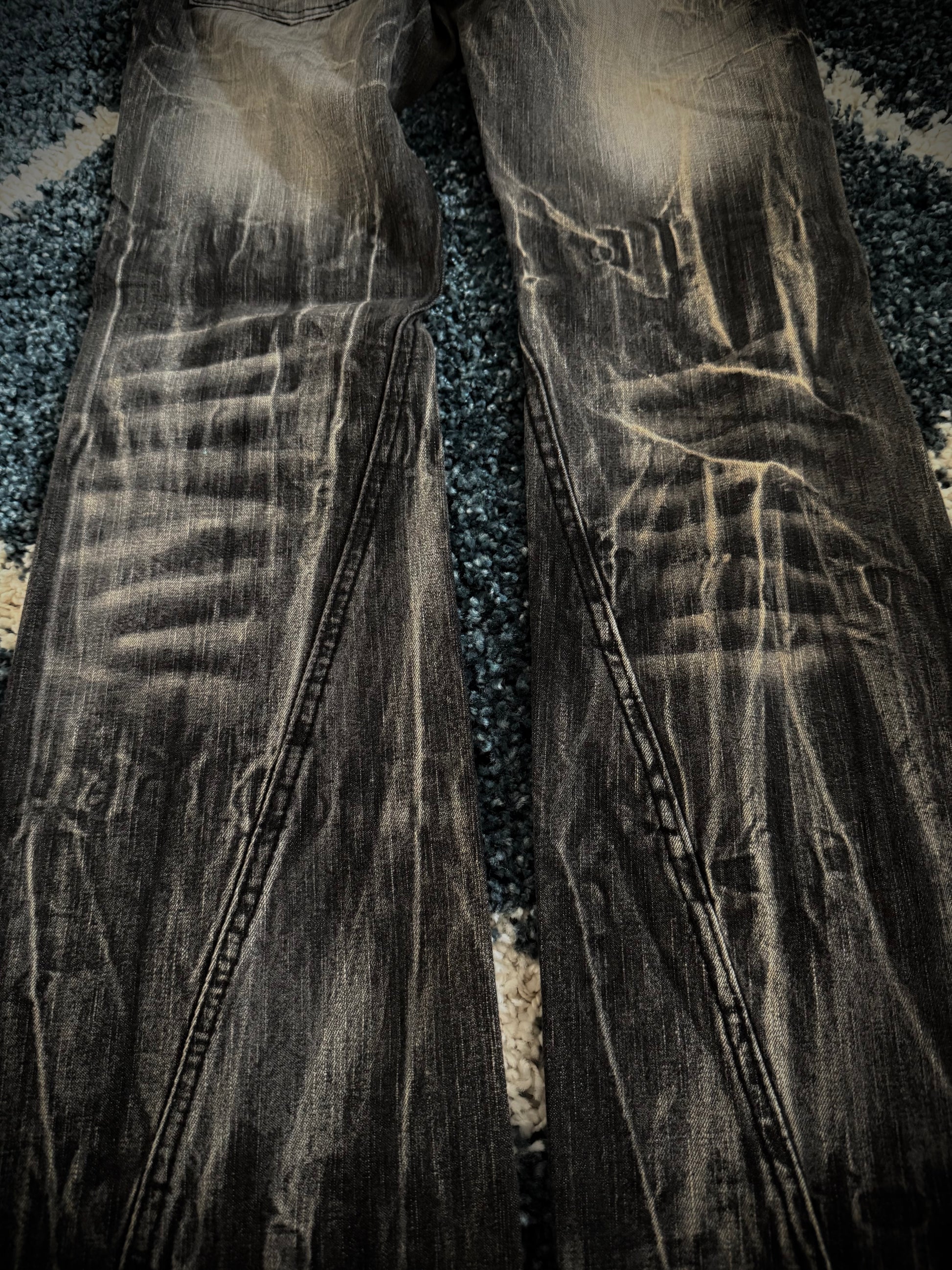 Black Baccara distressed flared denim