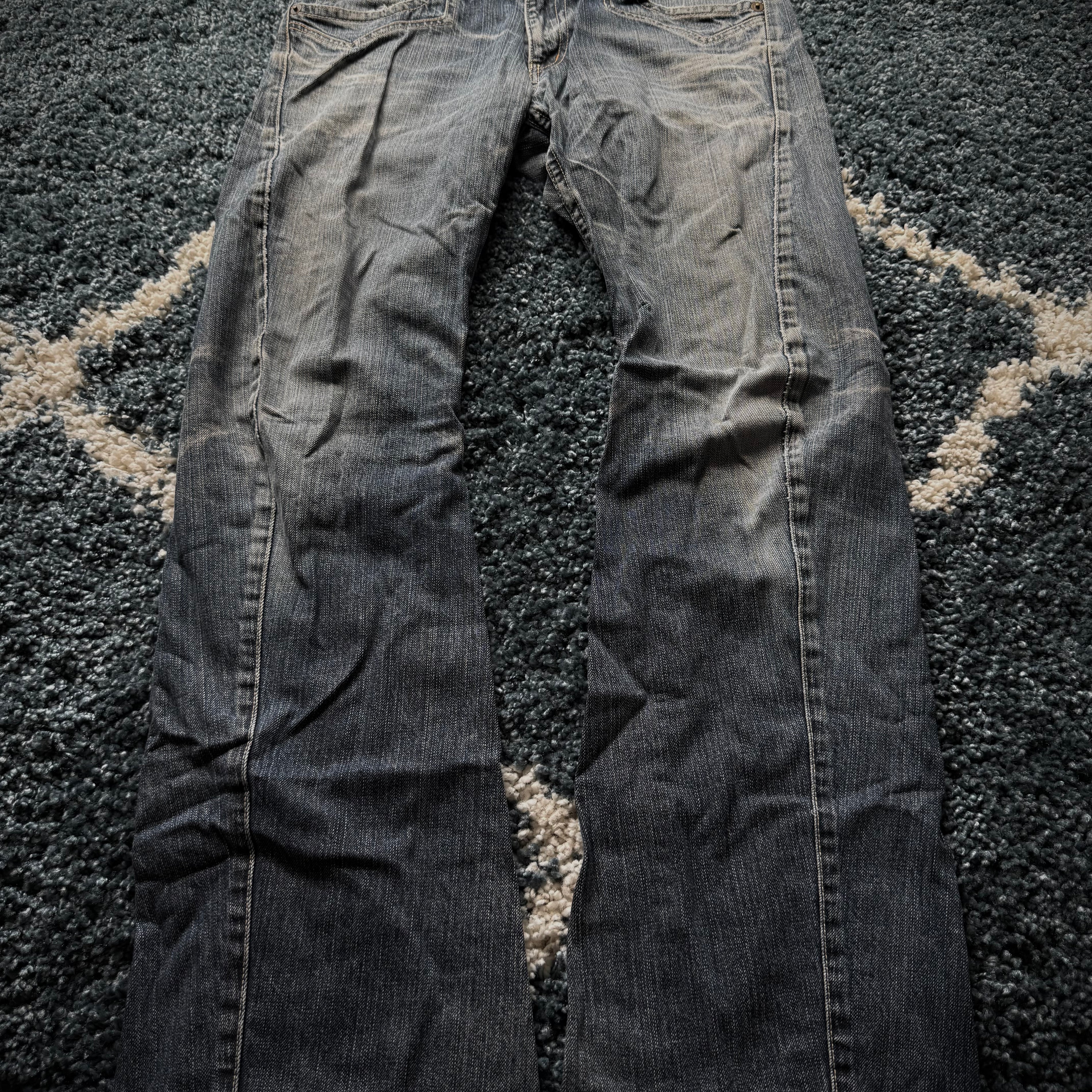Rattle Trap frozen asymmetrical pocket flared jeans