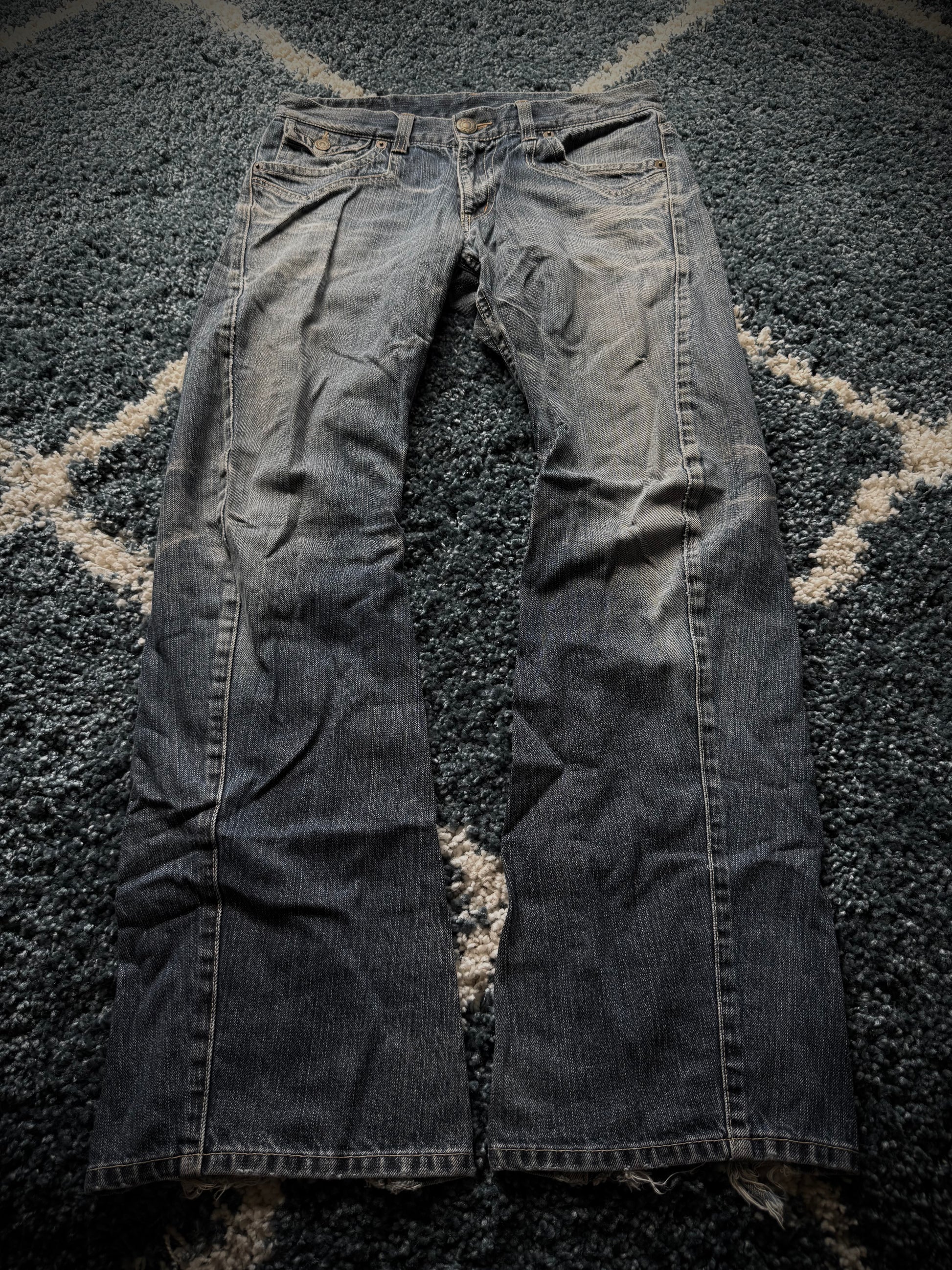 Rattle Trap frozen asymmetrical pocket flared jeans