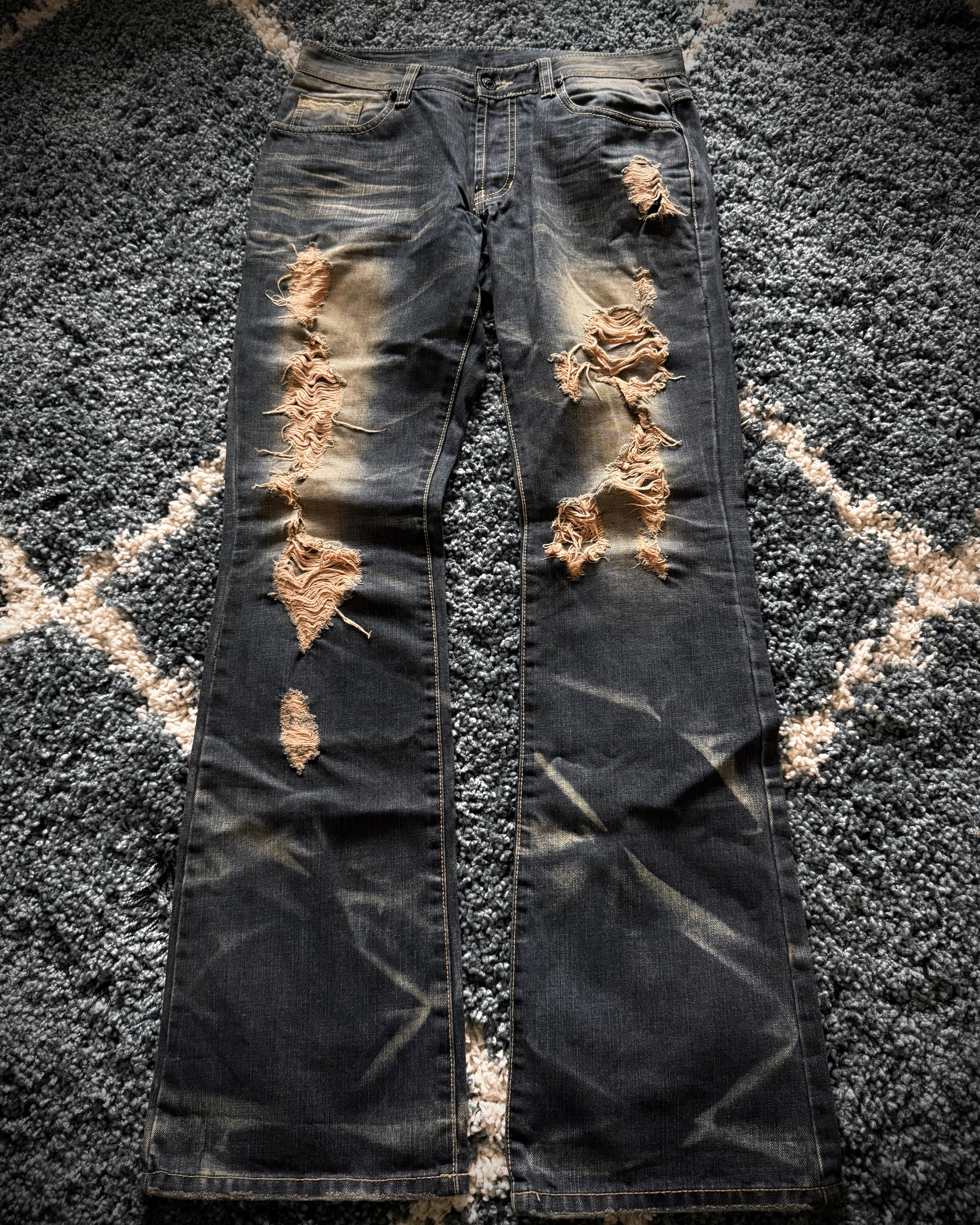 FUGA crashed distressed ponyhair&snakeskin patch flared denim