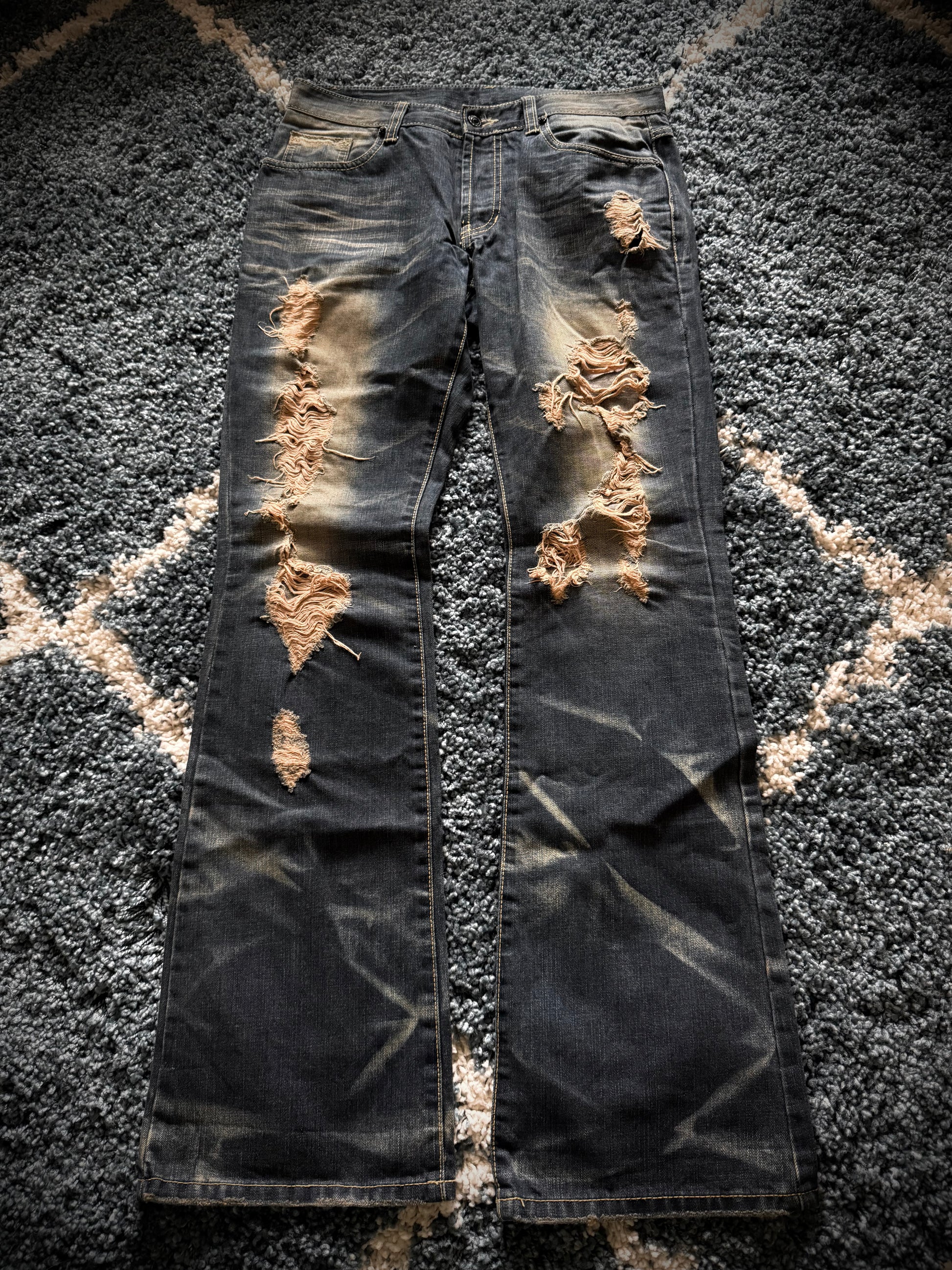 FUGA crashed distressed ponyhair&snakeskin patch flared denim