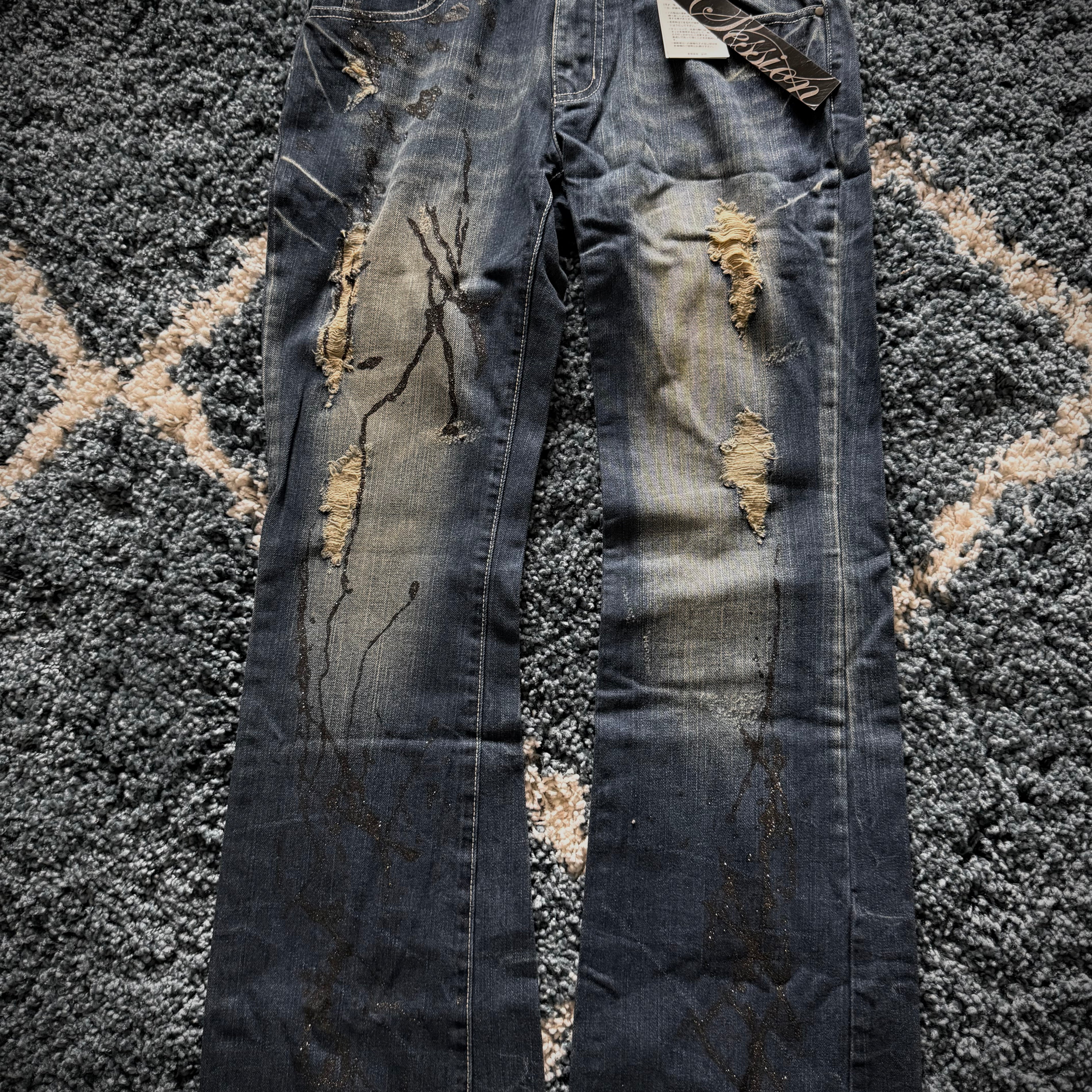 Session splattered glitter distressed flared jeans