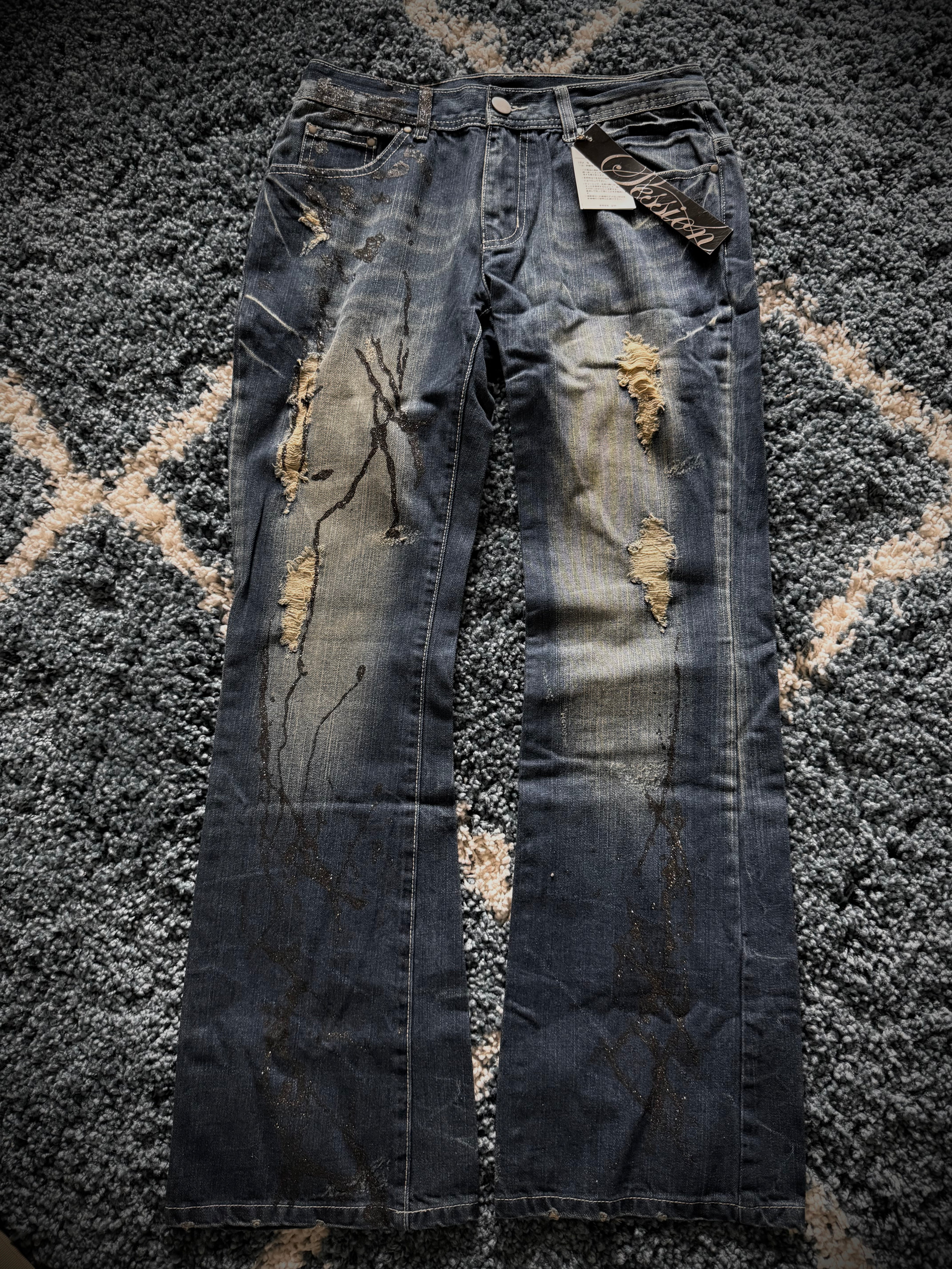 Session splattered glitter distressed flared jeans