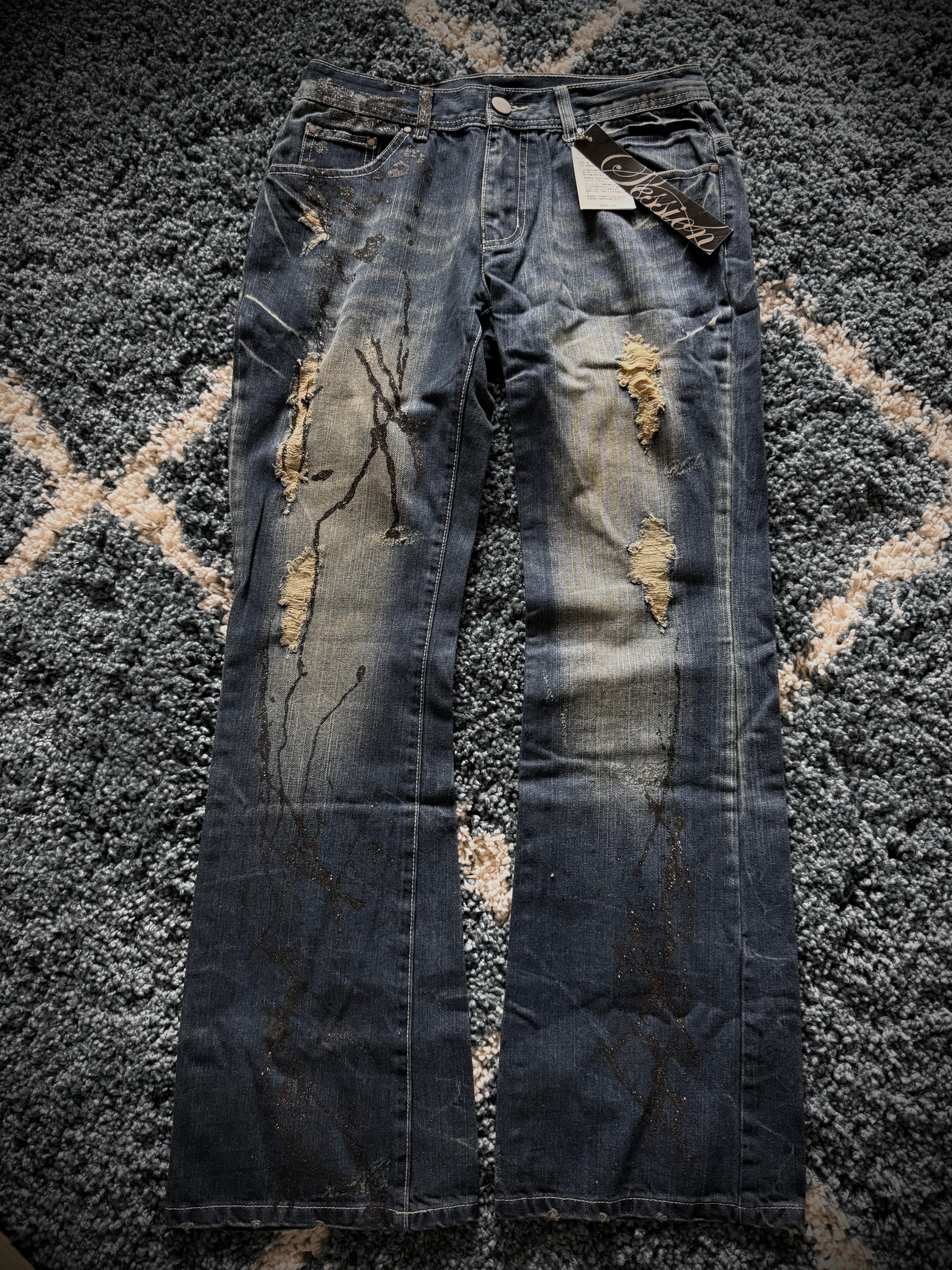 Nelson splattered glitter distressed flared jeans