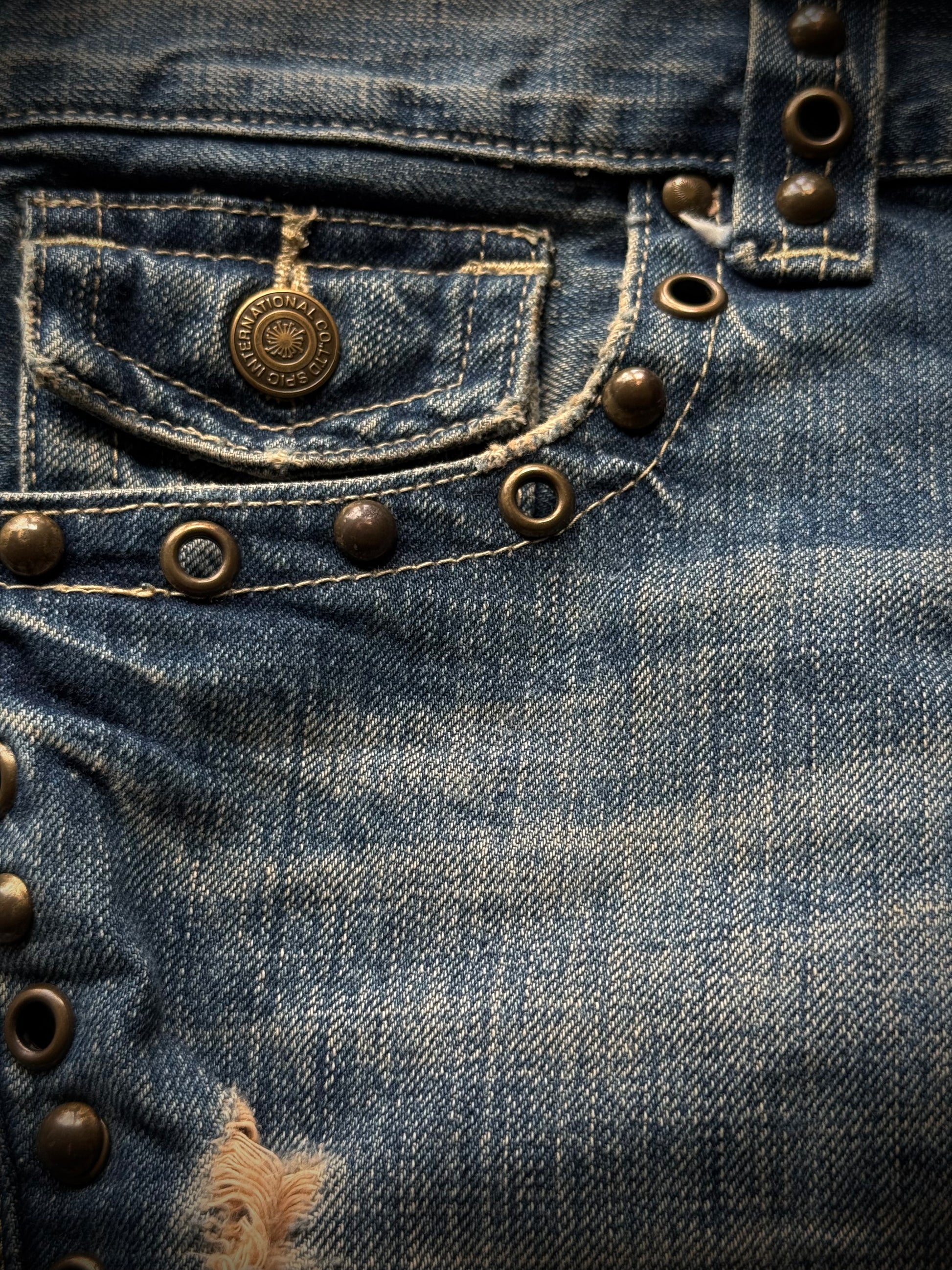 Tornado Mart spiral studded distressed flared jeans