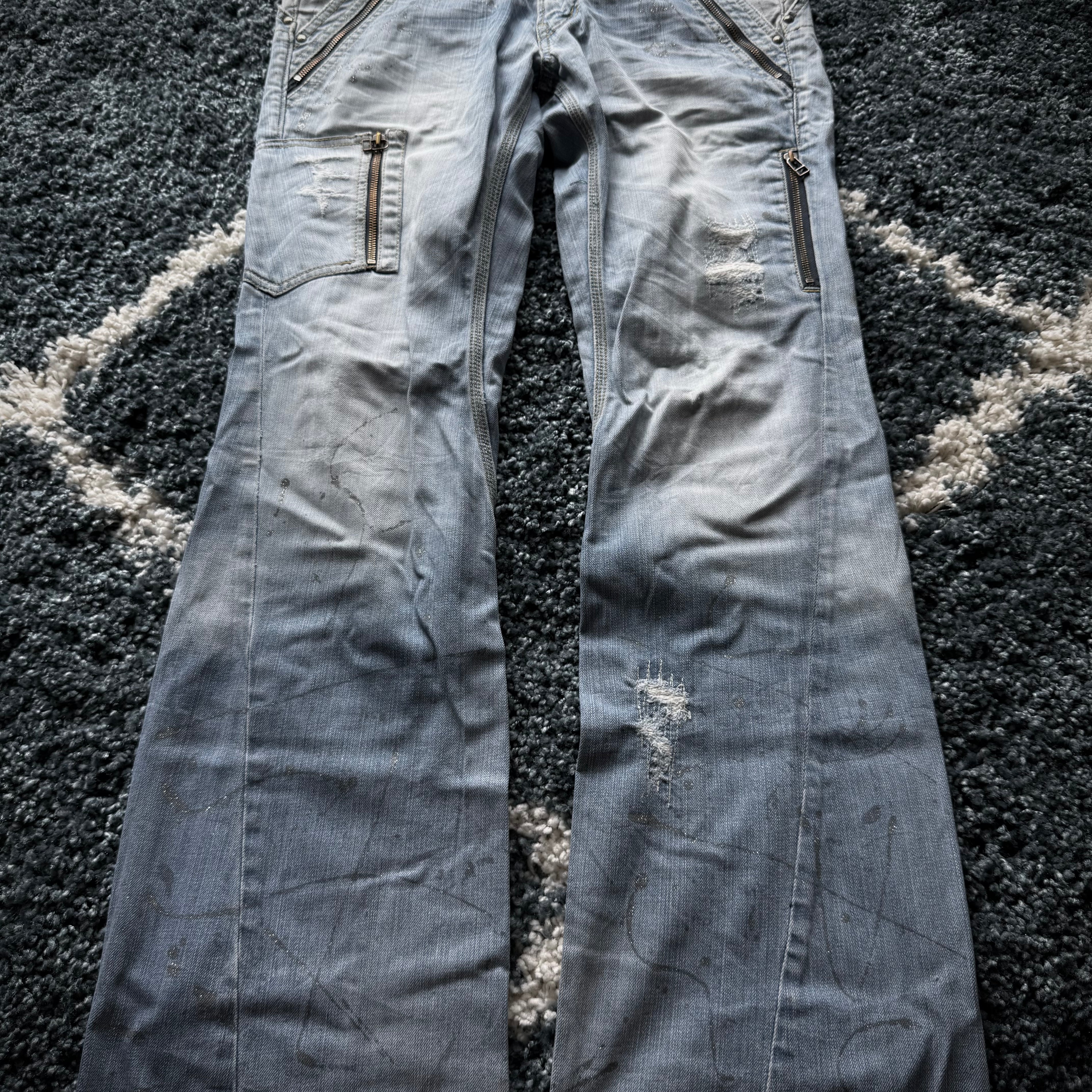 Nicole Club hidden pocket splashed spiral flared jeans