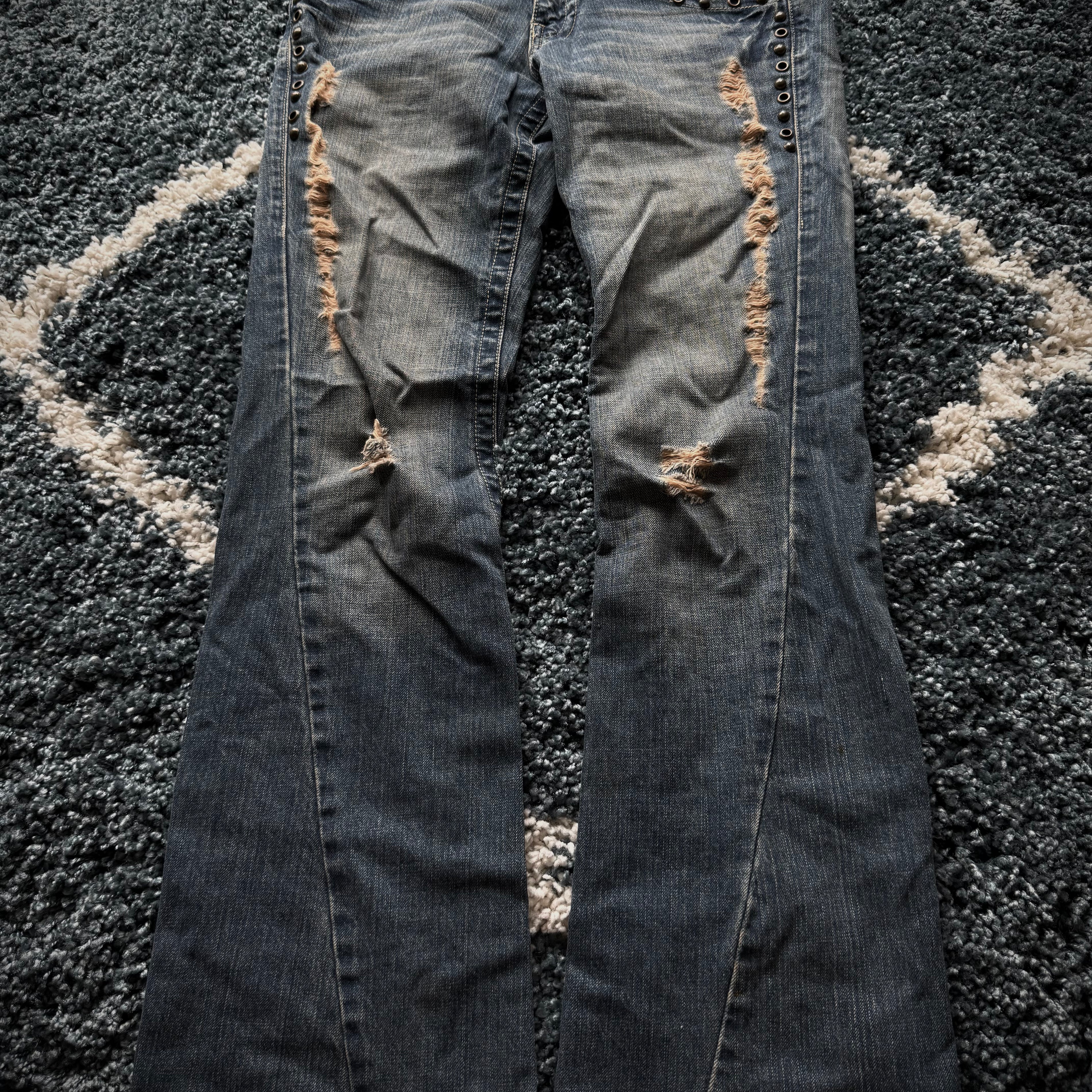 Tornado Mart spiral studded distressed flared jeans
