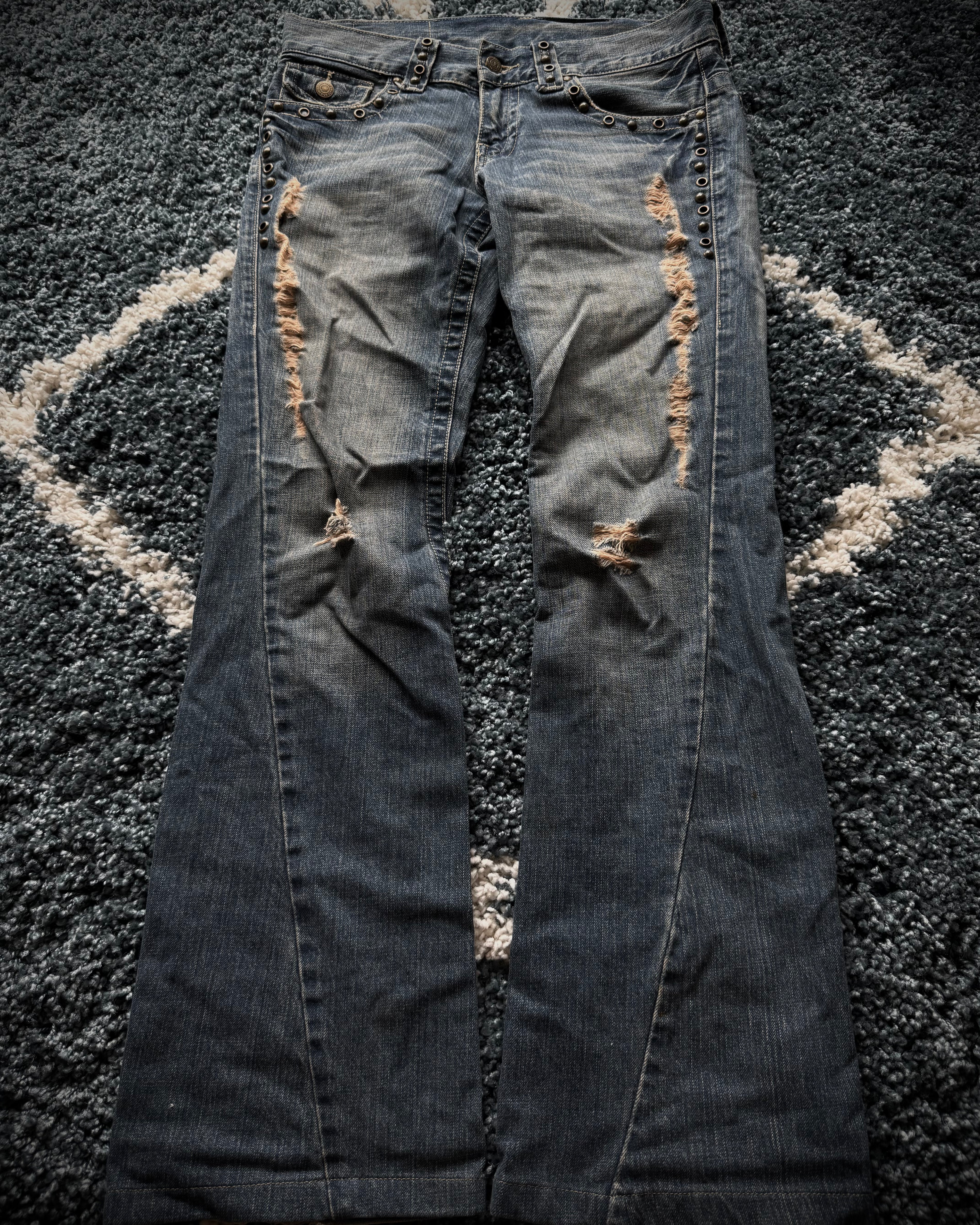 Tornado Mart spiral studded distressed flared jeans