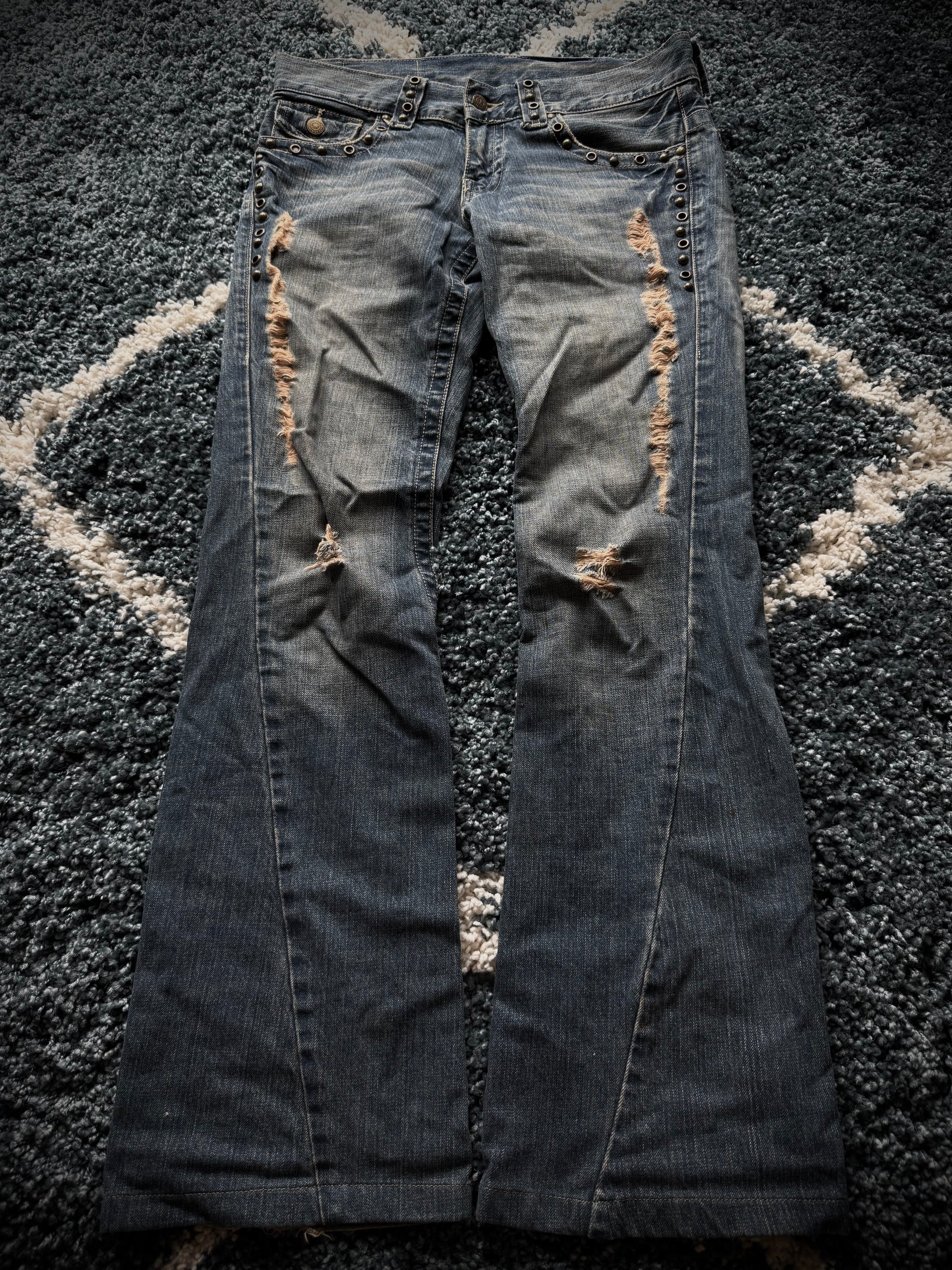 Tornado Mart spiral studded distressed flared jeans