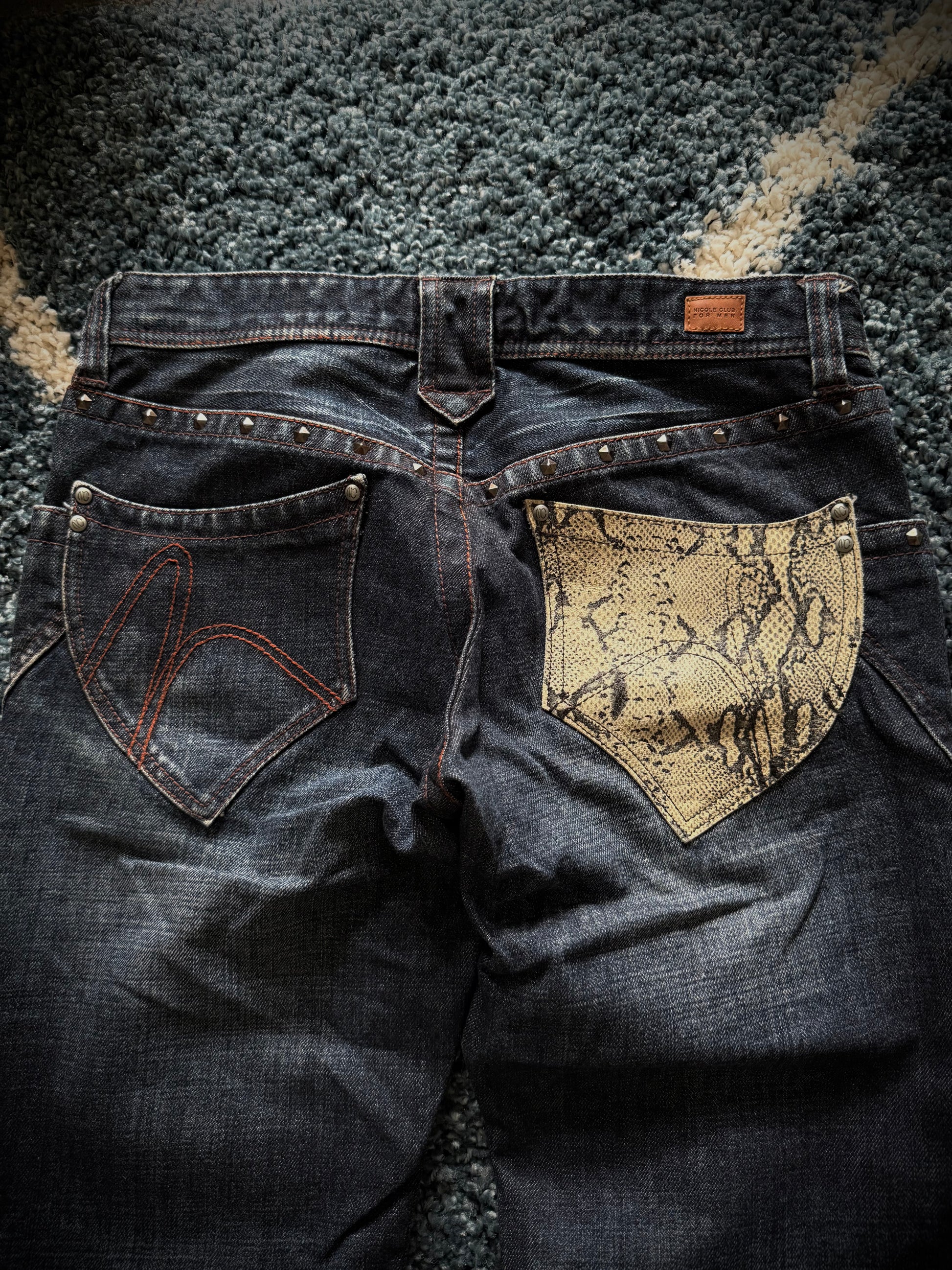 Nicole Club studded Snakeskin flared jeans