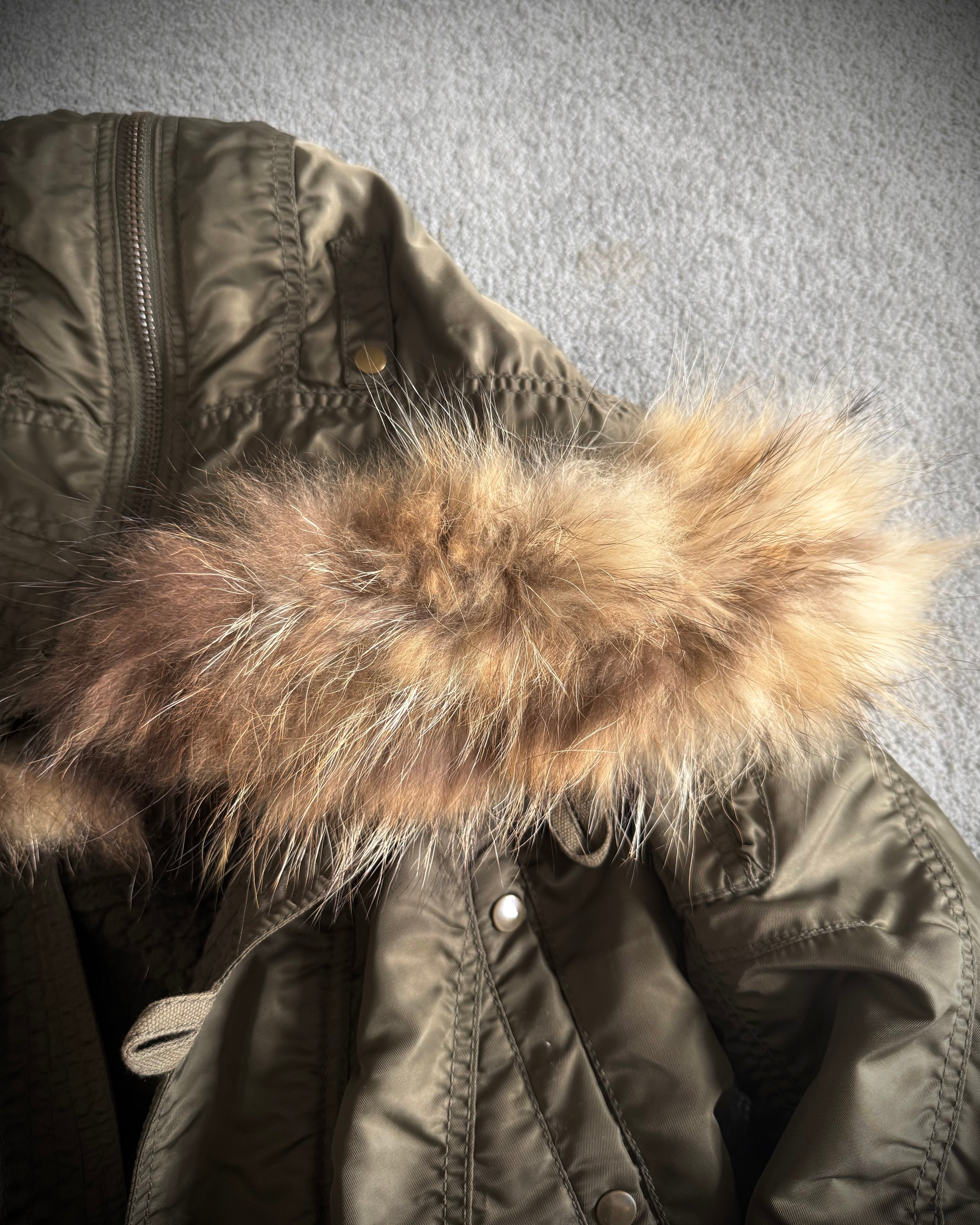 G.O.A Raccoon split fur coat wool interior