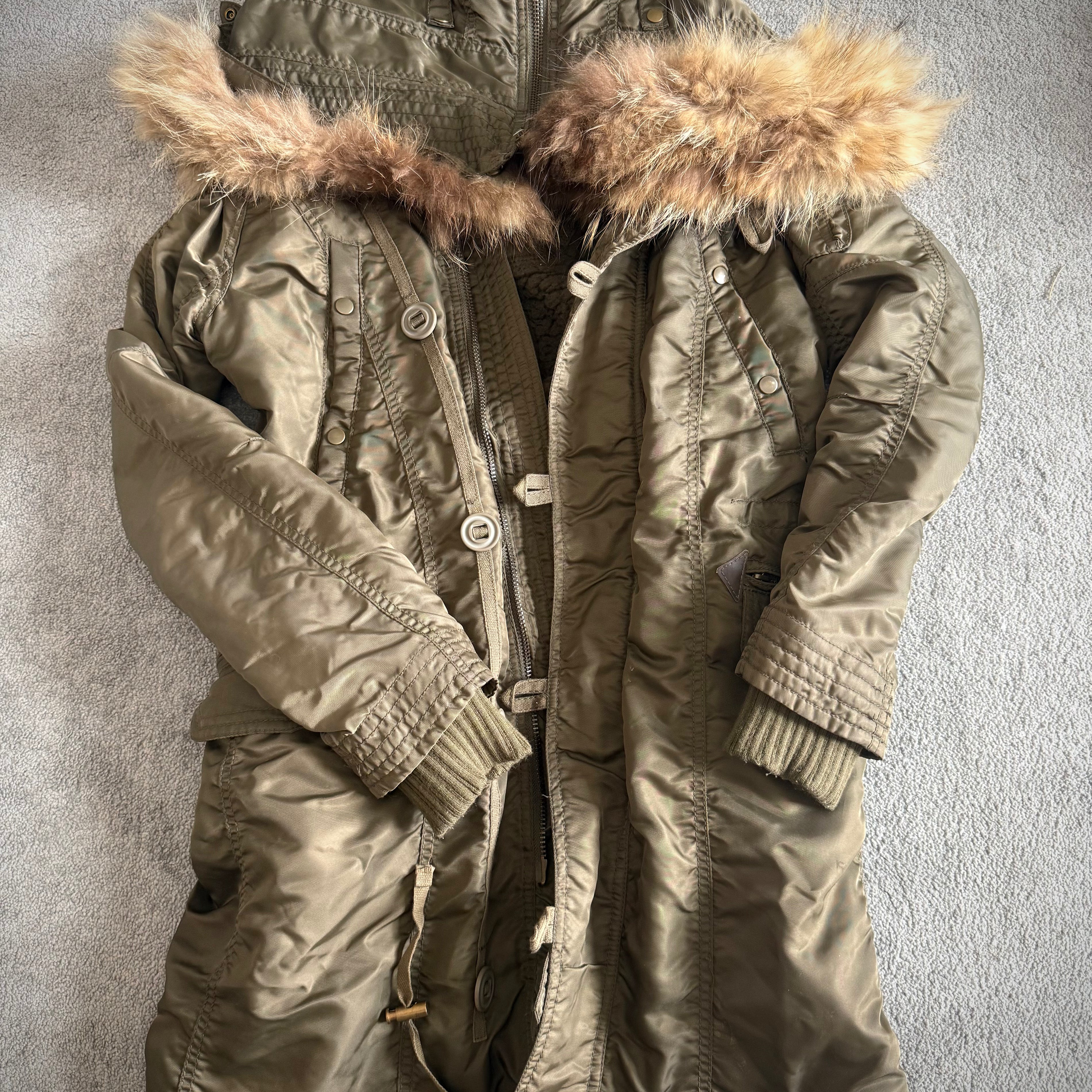 G.O.A Raccoon split fur coat wool interior