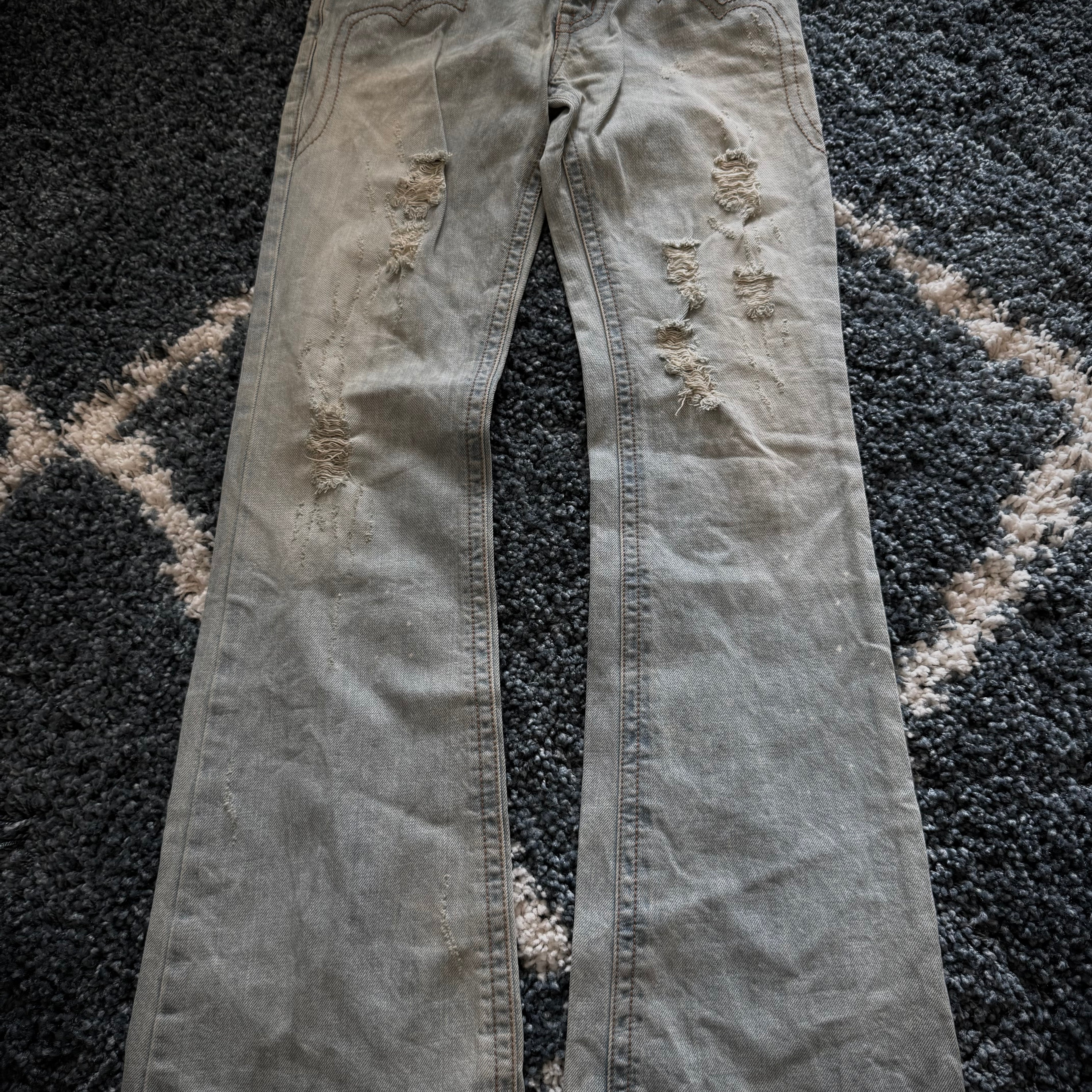 Kingsman leather detailed distressed flared denim