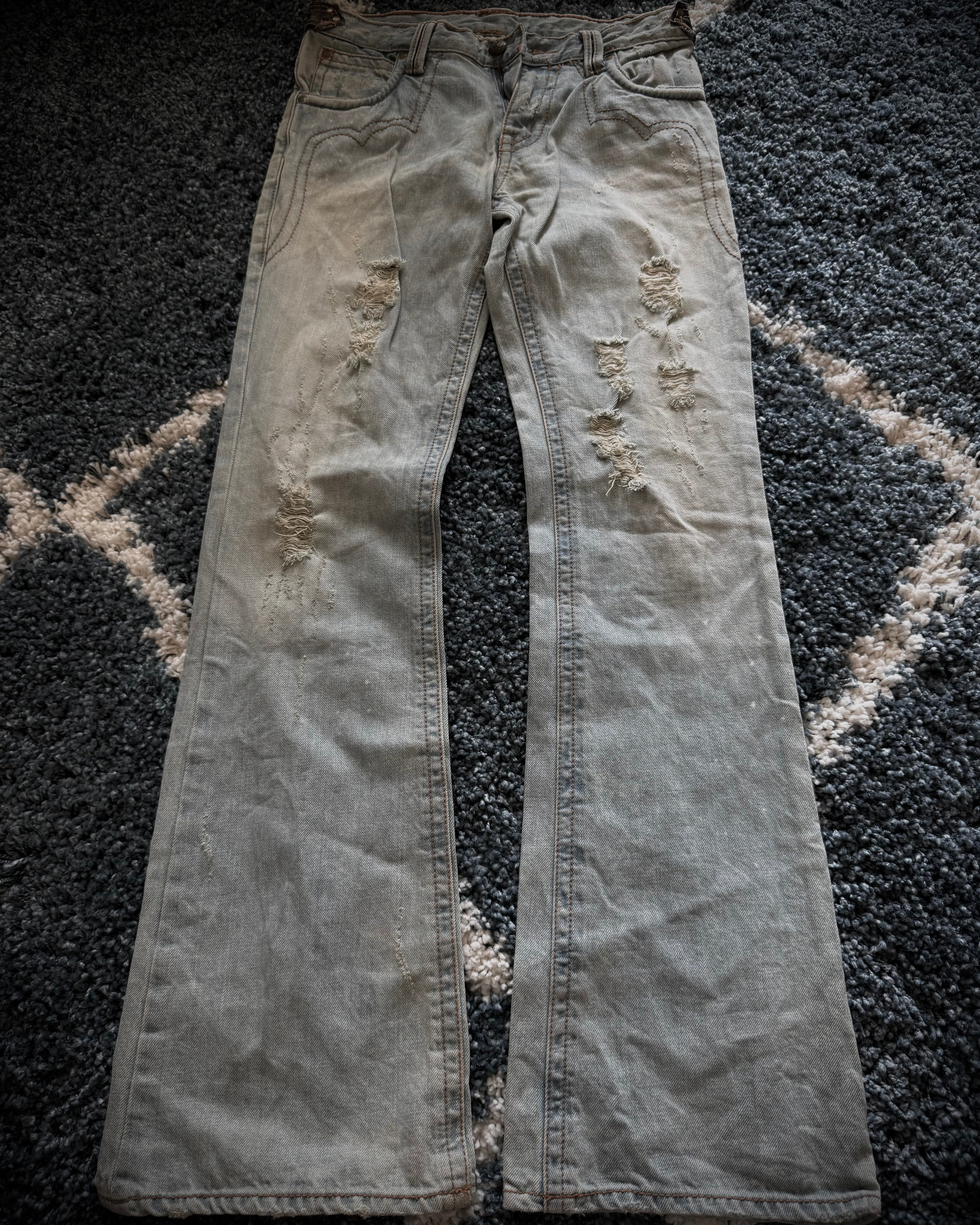 Kingsman leather detailed distressed flared denim