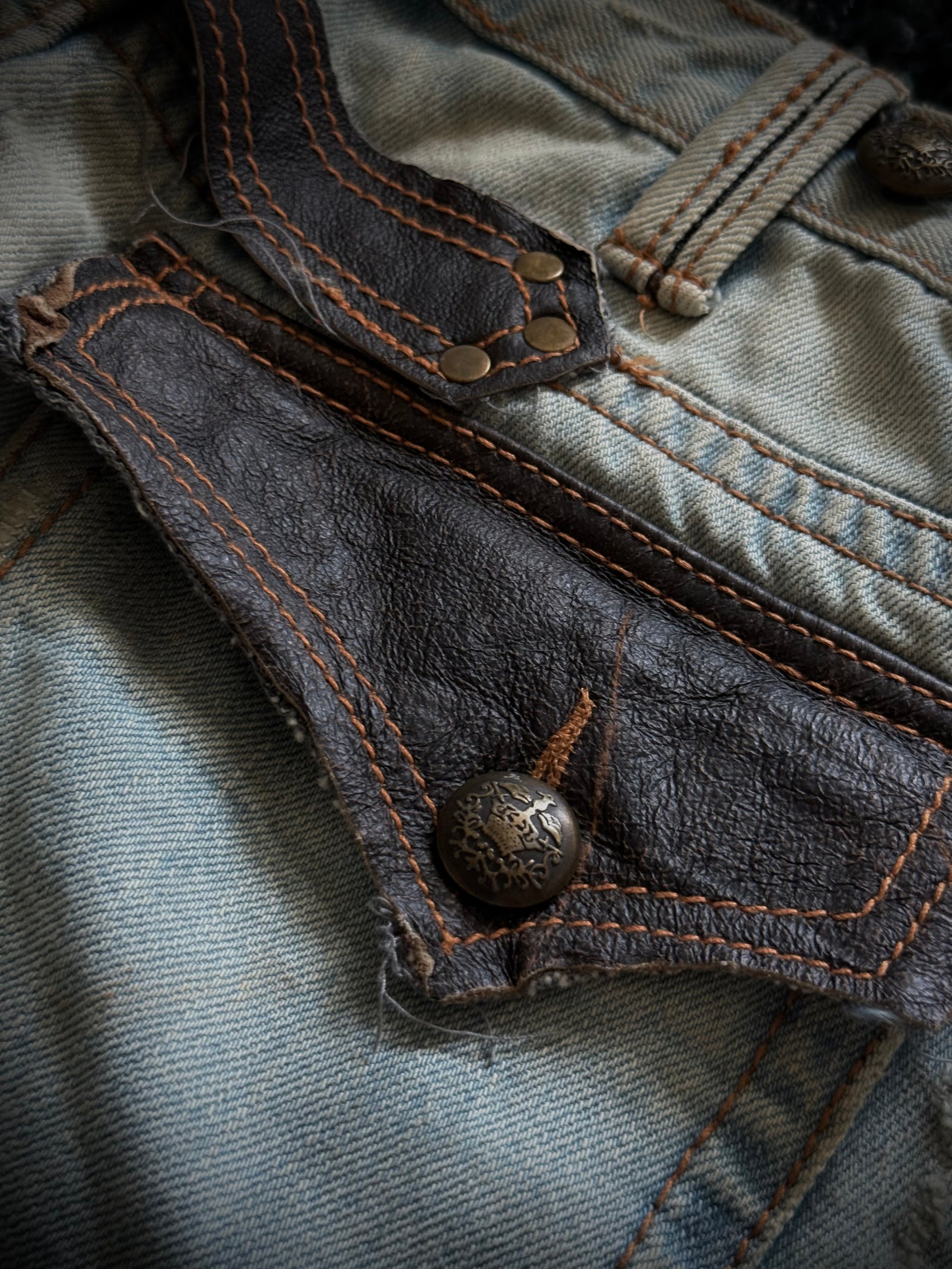Kingsman leather detailed distressed flared denim